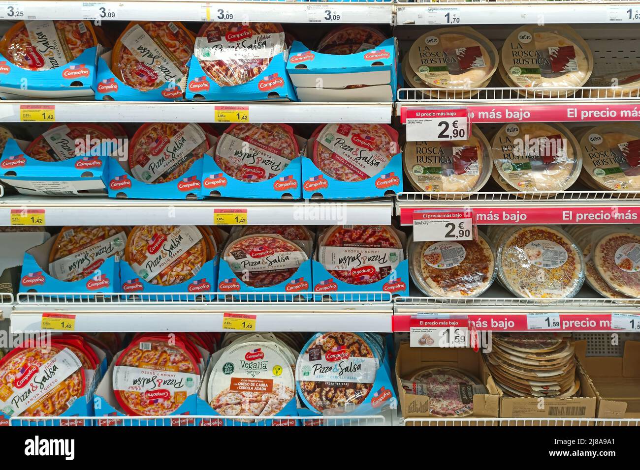 Huelva, Spain - May 10, 2022: Shelf of ready to bake pizza in a supermarket Stock Photo