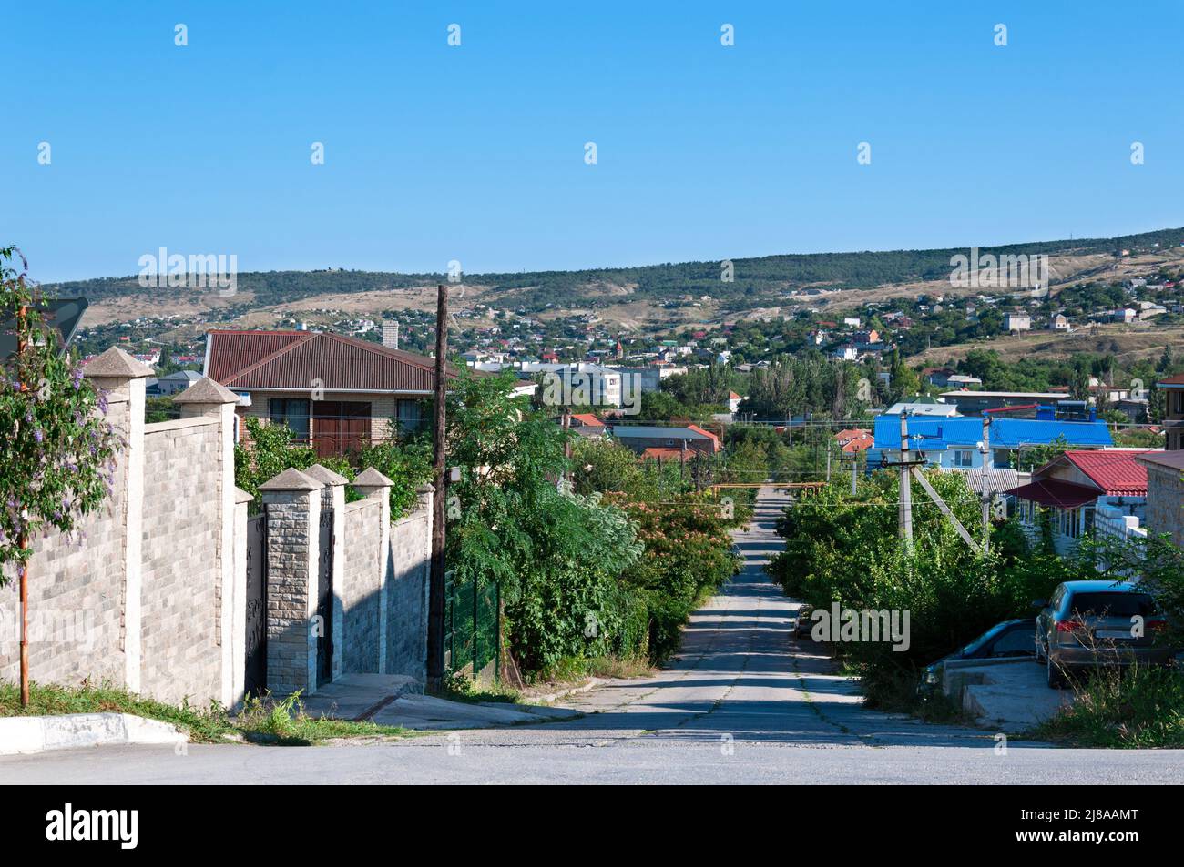 September 5, 2021 Republic of Crimea Feodosia. Urban landscape, private sector of the city. Summer sunny evening. Stock Photo