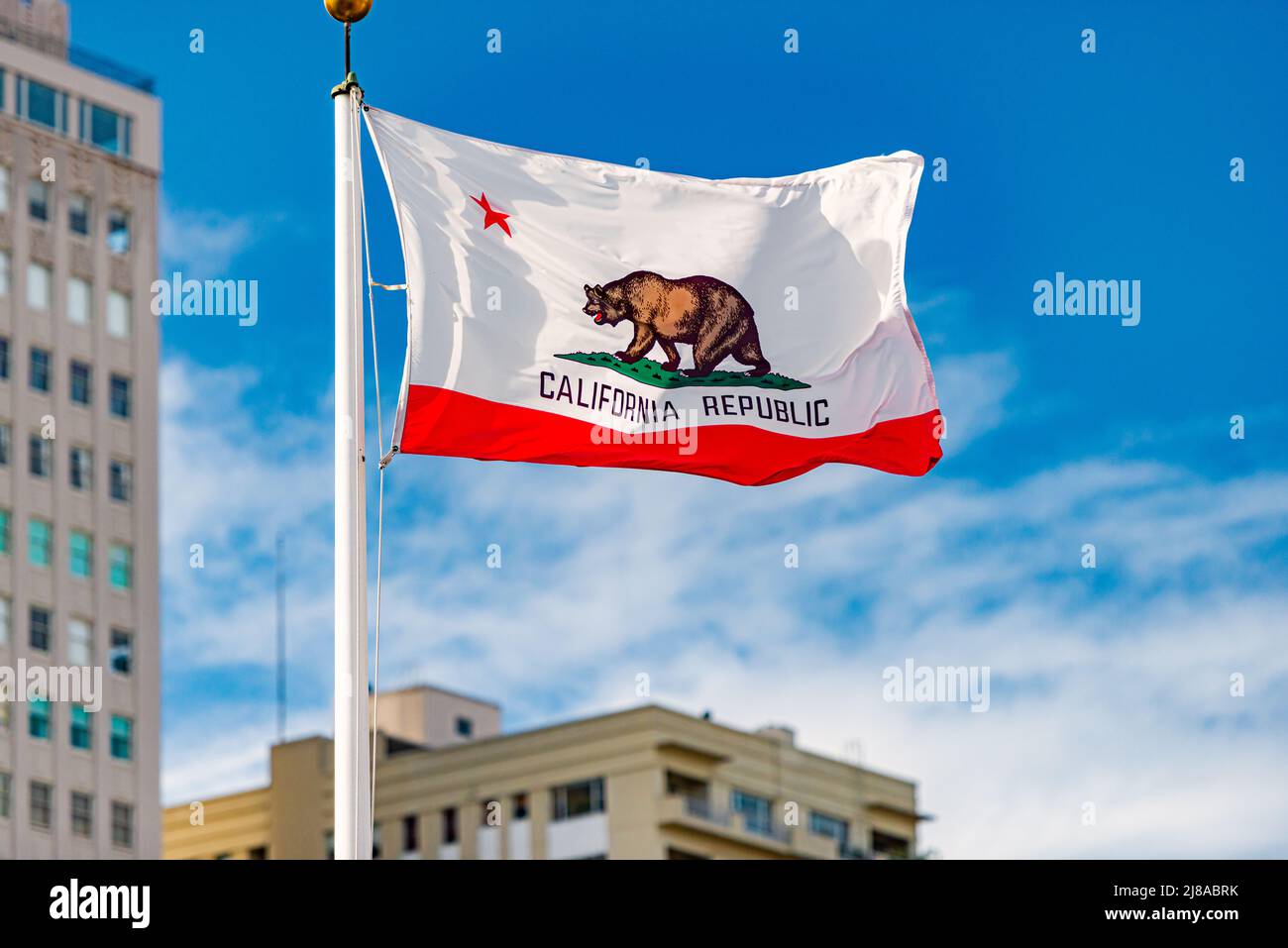 Flag of California Republic in San Francisco. Blue sky with clouds in background. Stock Photo