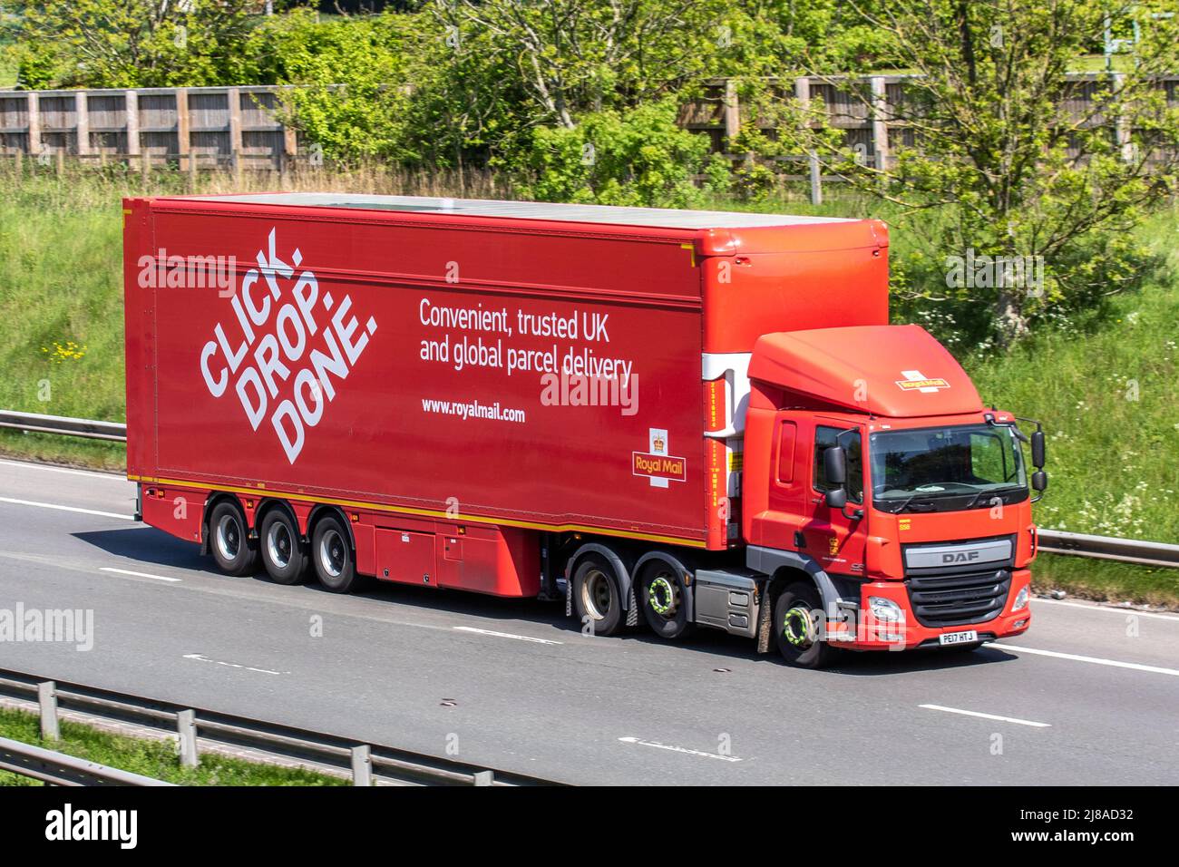 Royal Mail Haulage delivery trucks, lorry, transportation, truck, cargo carrier, DAF vehicle, European commercial transport, industry, M6 at Manchester, UK Stock Photo