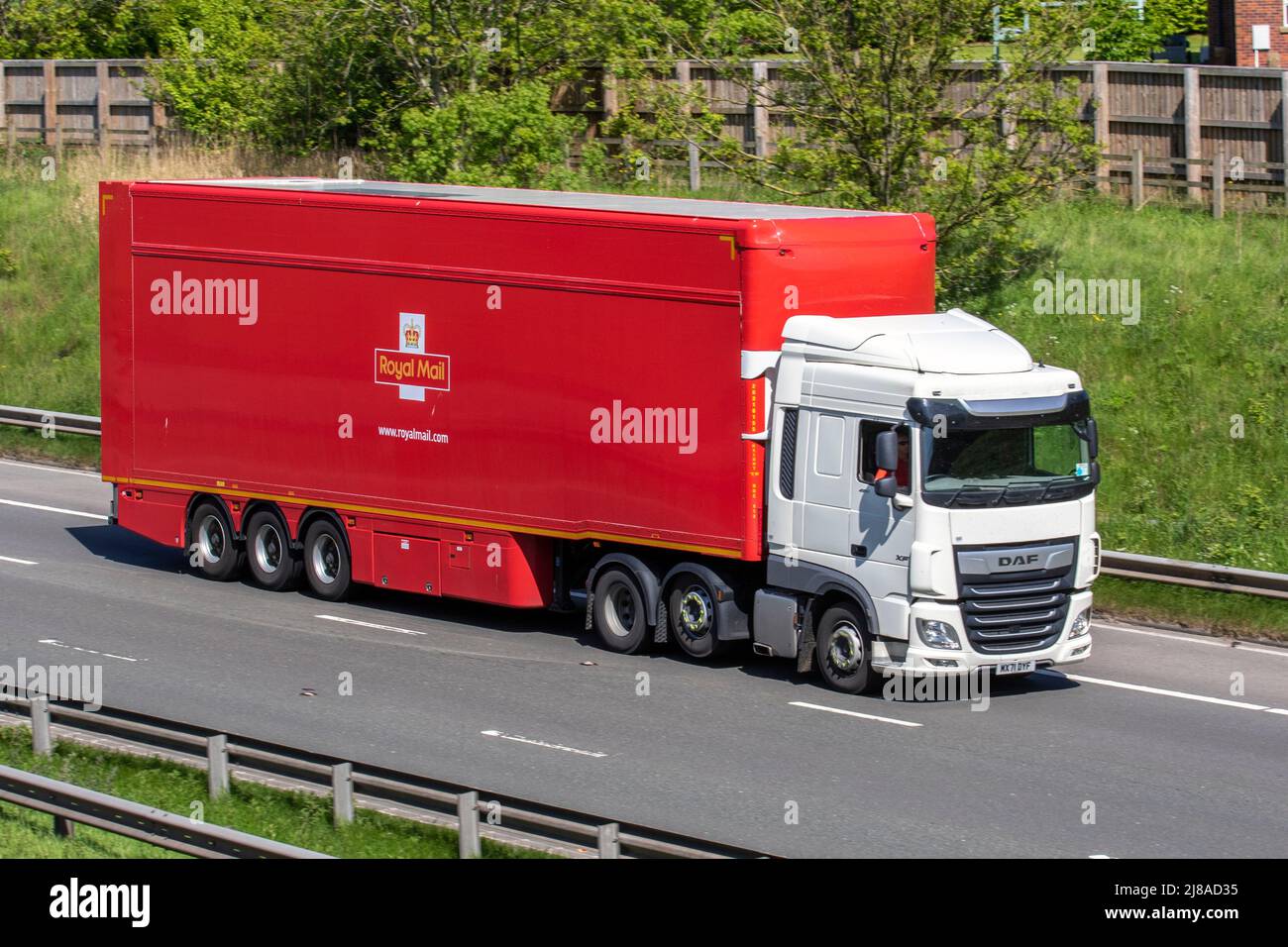 Royal Mail Haulage delivery trucks, lorry, transportation, truck, cargo carrier, DAF vehicle, European commercial transport, industry, M6 at Manchester, UK Stock Photo