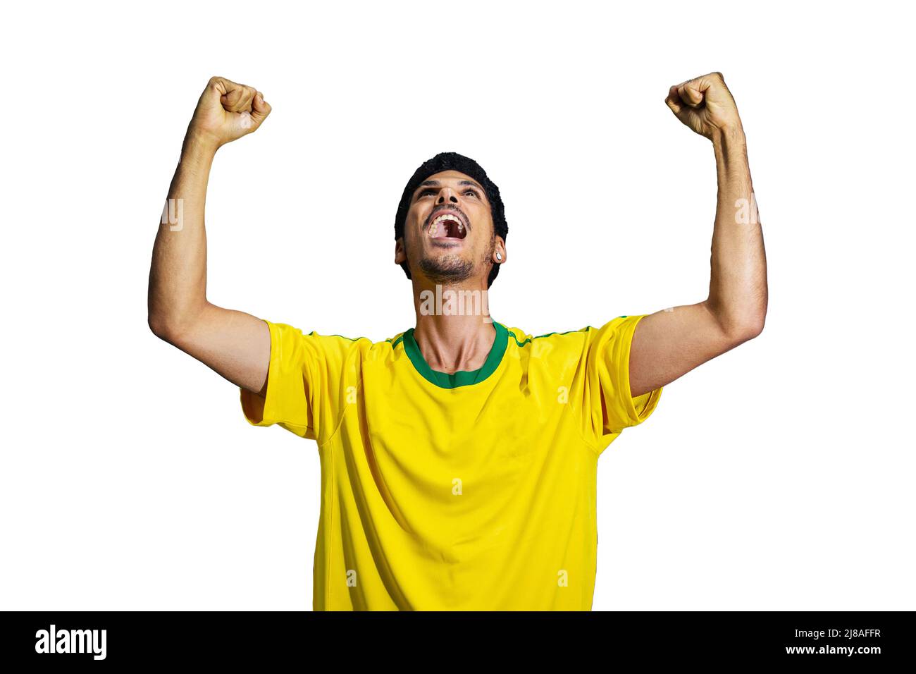 Male athlete or fan in yellow uniform celebrating isolated Stock Photo