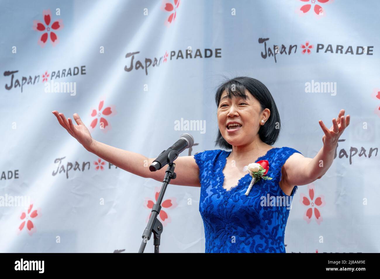 New York, USA. 14th May, 2022. A singer sings the US National anthem before the start of New York City's first Japan Day Parade. Credit: Enrique Shore/Alamy Live News Stock Photo