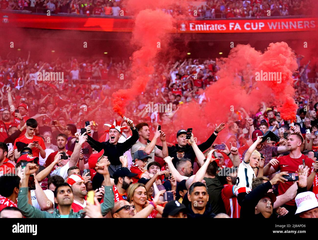 Liverpool fans set off flares during the Emirates FA Cup final at Wembley Stadium, London