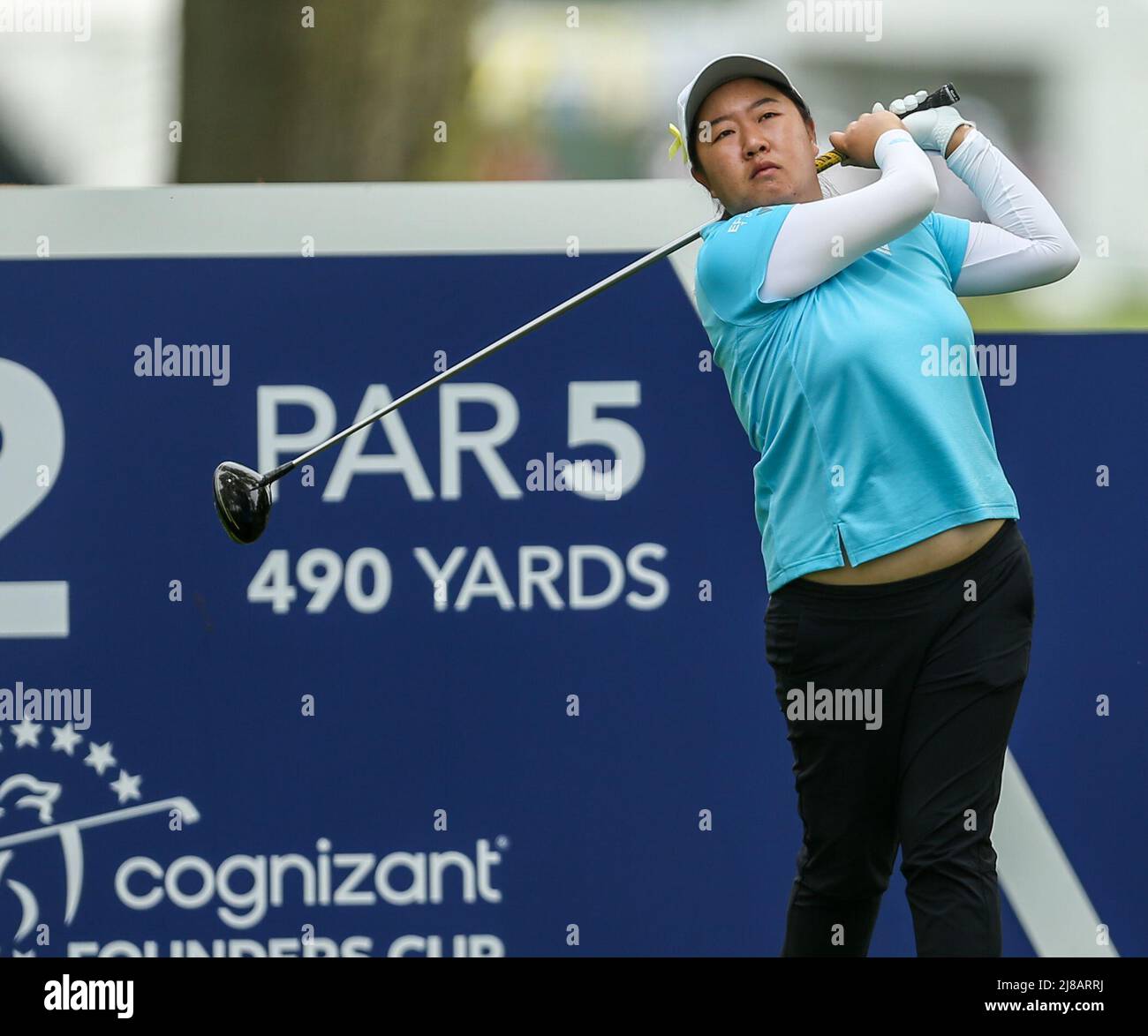 Clifton, NJ, USA. 14th May, 2022. Ruixin Liu watches her drive from the second tee during the third round of the LPGA Cognizant Founders Cup at the Upper Montclair Country Club in Clifton, NJ. Mike Langish/Cal Sport Media. Credit: csm/Alamy Live News Stock Photo