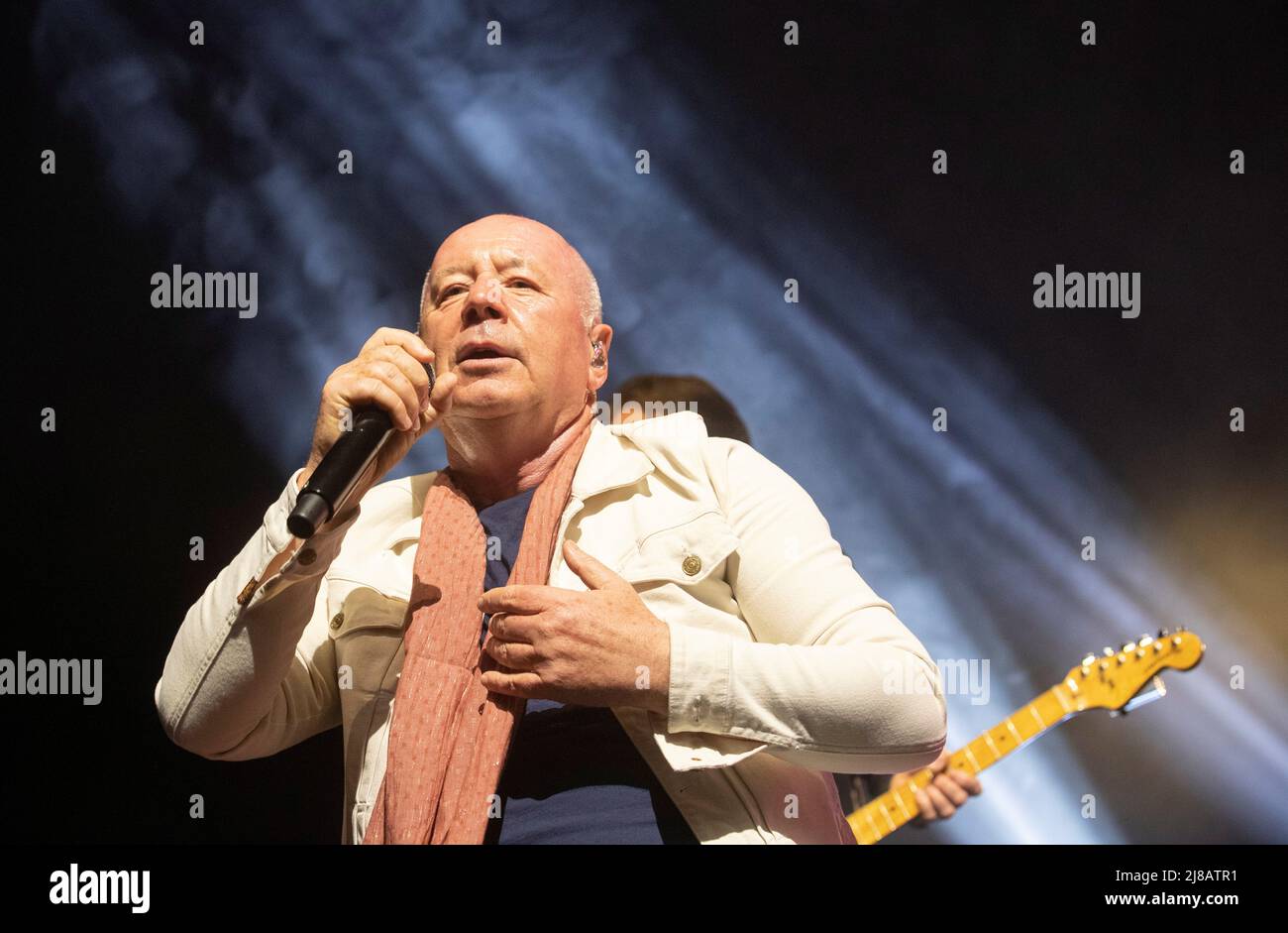 Lead singer Jim Kerr of Scottish band Simple Minds performs during a