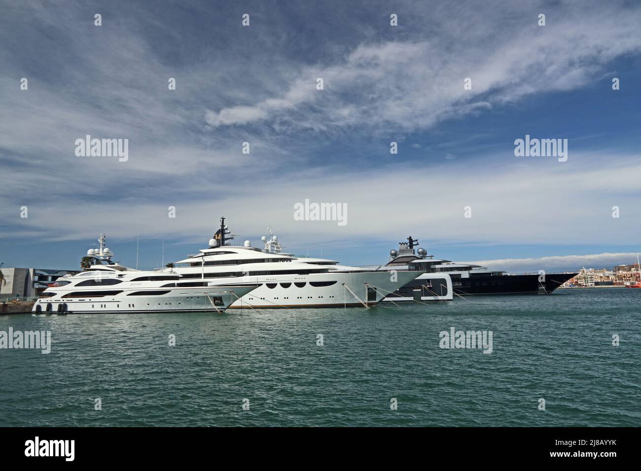 Superyachts 'Jaguar', 'Quattroell' , 'Illusion Plus' and 'Crescent' moored in port, Tarragona Stock Photo