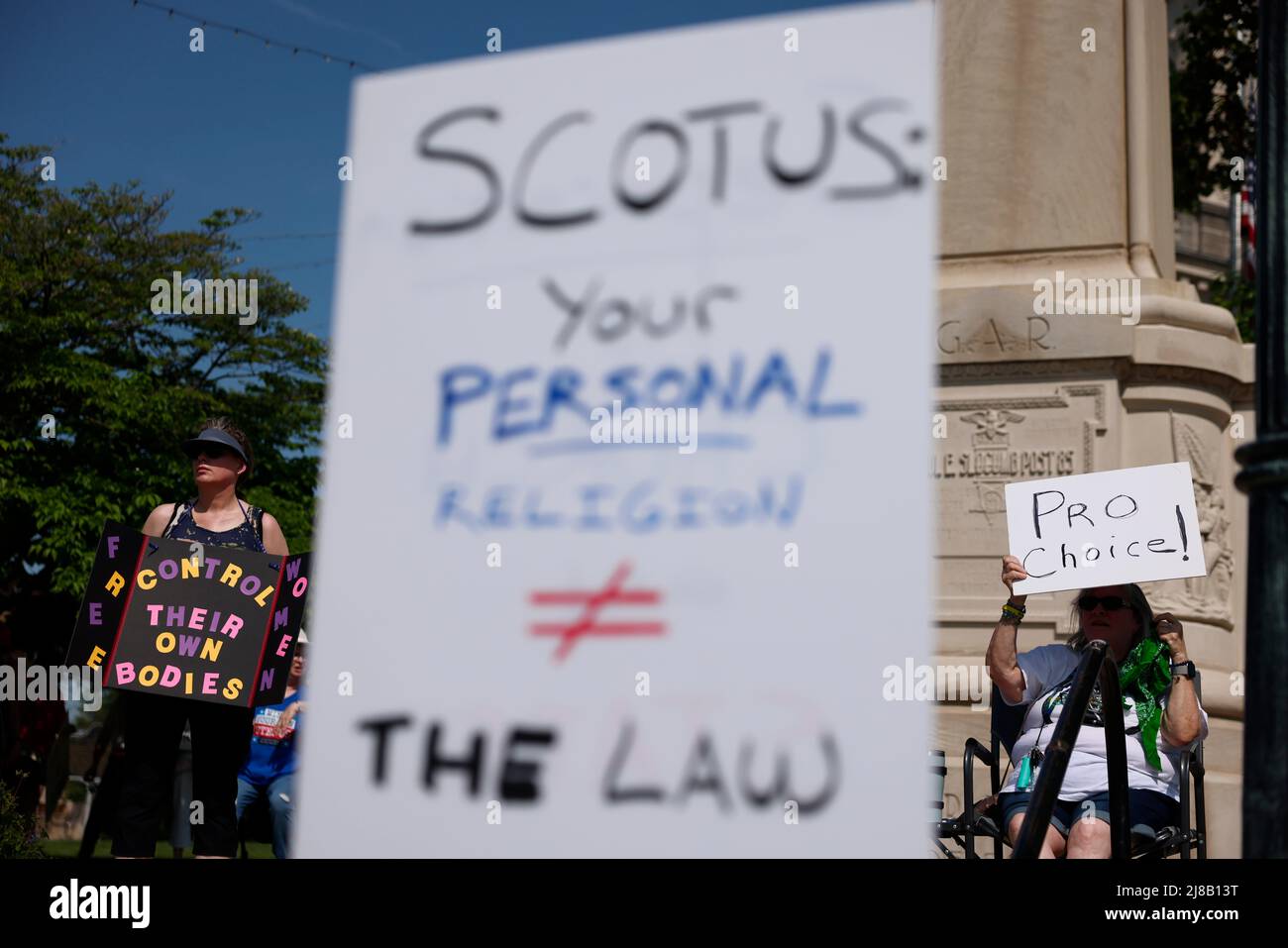 Bloomington, United States. 14th May, 2022. A protester holds a placard expressing her opinion during a Women's March to demand safe and legal access to abortion. A leaked draft opinion indicated the United States Supreme Court will overturn Roe. v. Wade in June. Roe said the constitution guarantees a person's right to an abortion. (Photo by Jeremy Hogan/SOPA Images/Sipa USA) Credit: Sipa USA/Alamy Live News Stock Photo