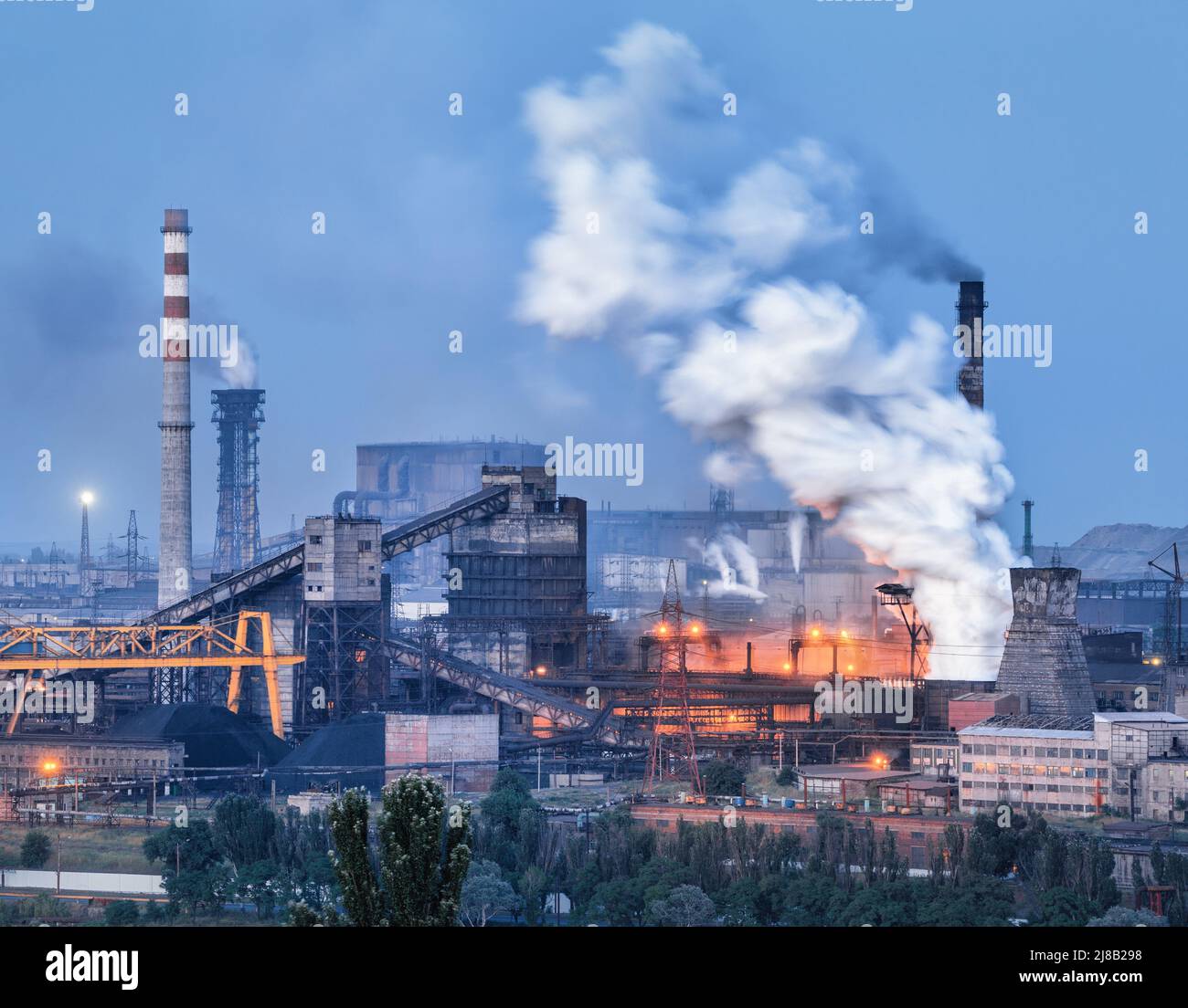 Azovstal in Mariupol, Ukraine before war. Steel plant at night Stock Photo