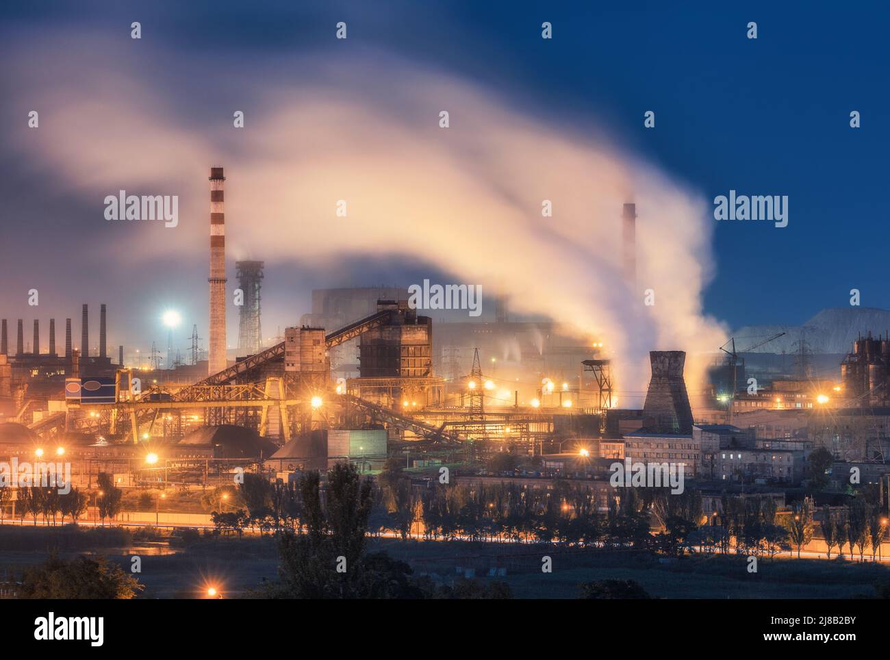 Azovstal in Mariupol, Ukraine before war. Steel plant at night Stock Photo