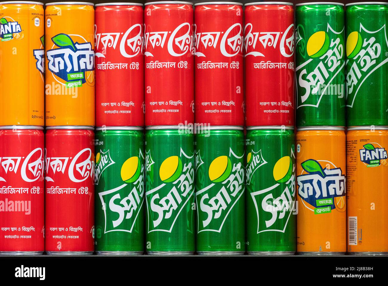 American soft drink brands, Cocacola, Sprint, and Fanta, are seen for sale at a snack stall at