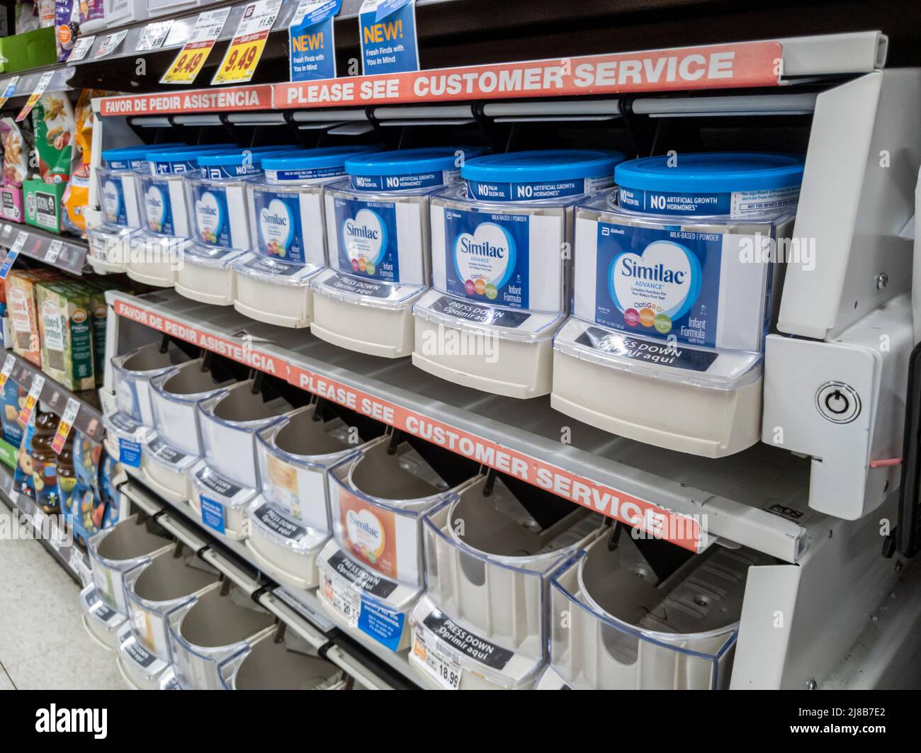 Lynnwood, WA USA - circa May 2022: Angled view of bare shelves during a baby formula shortage inside a QFC grocery store. Stock Photo