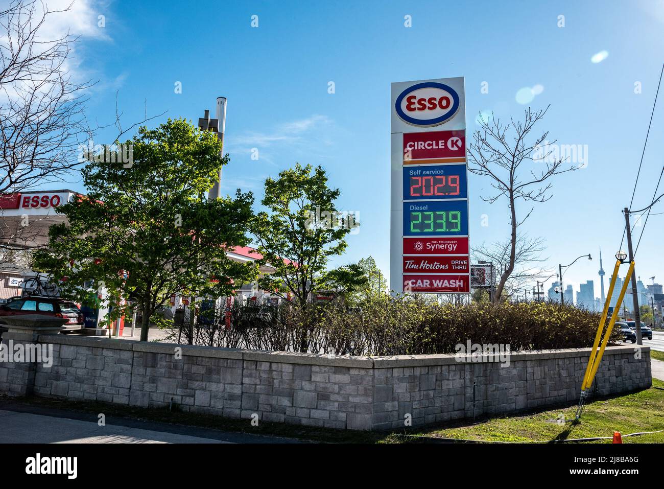 Toronto, Canada. 14th May 2022. An Esso gas station on Lakeshore East displays the latest gas price as Toronto area reaches a record high of above two dollar per litre on Saturday. Dominic Chan/EXimages Credit: EXImages/Alamy Live News Stock Photo