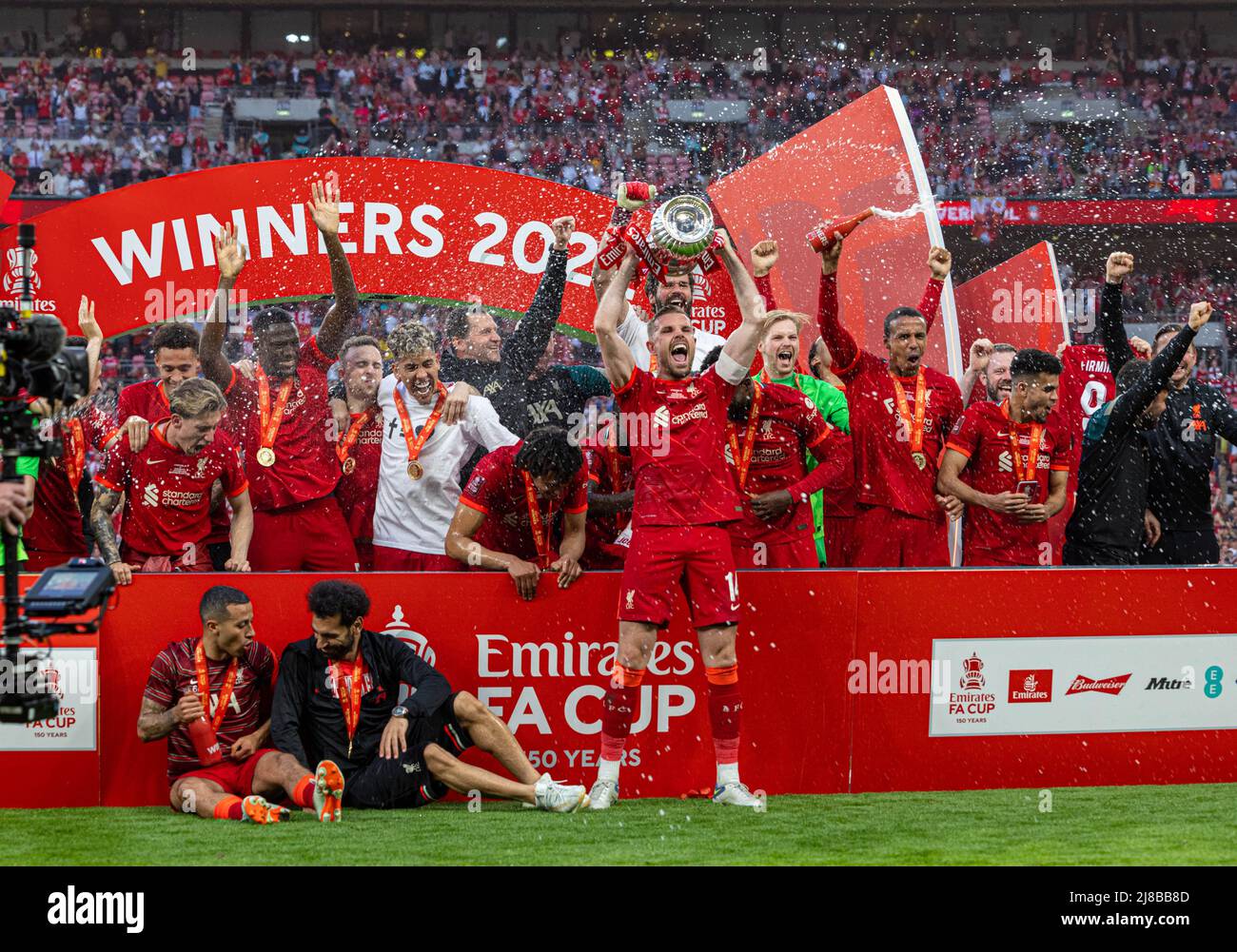 Liverpool captain jordan henderson lifts trophy hi res stock