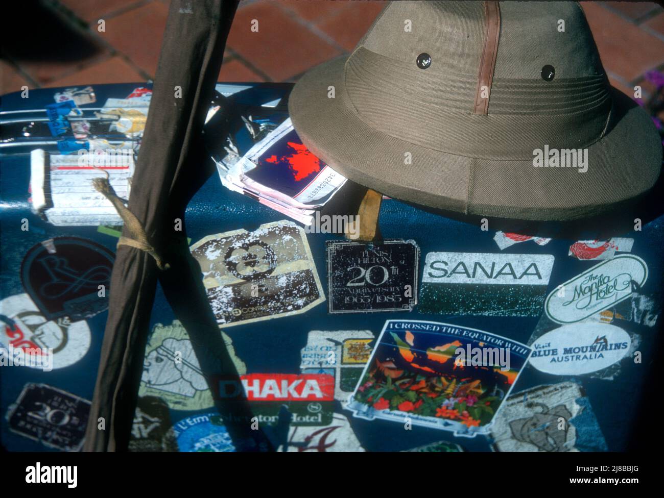 Travel as it once was with Samsonite suitcase, air -tickets, fishing roads and sun helmet. Stock Photo
