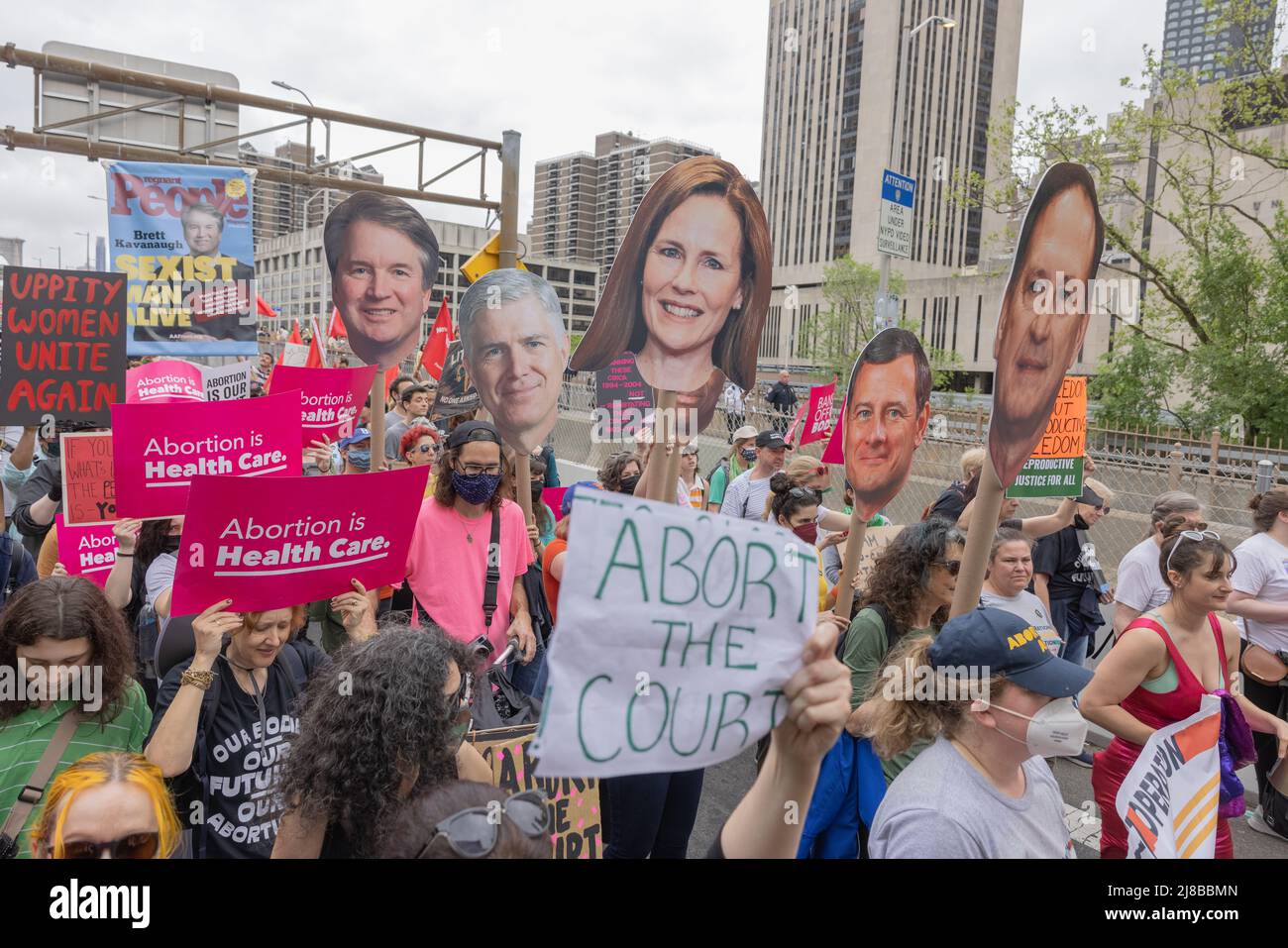 NEW YORK, N.Y. – May 14, 2022: Abortion rights protesters march across the Brooklyn Bridge during a demonstration. Stock Photo