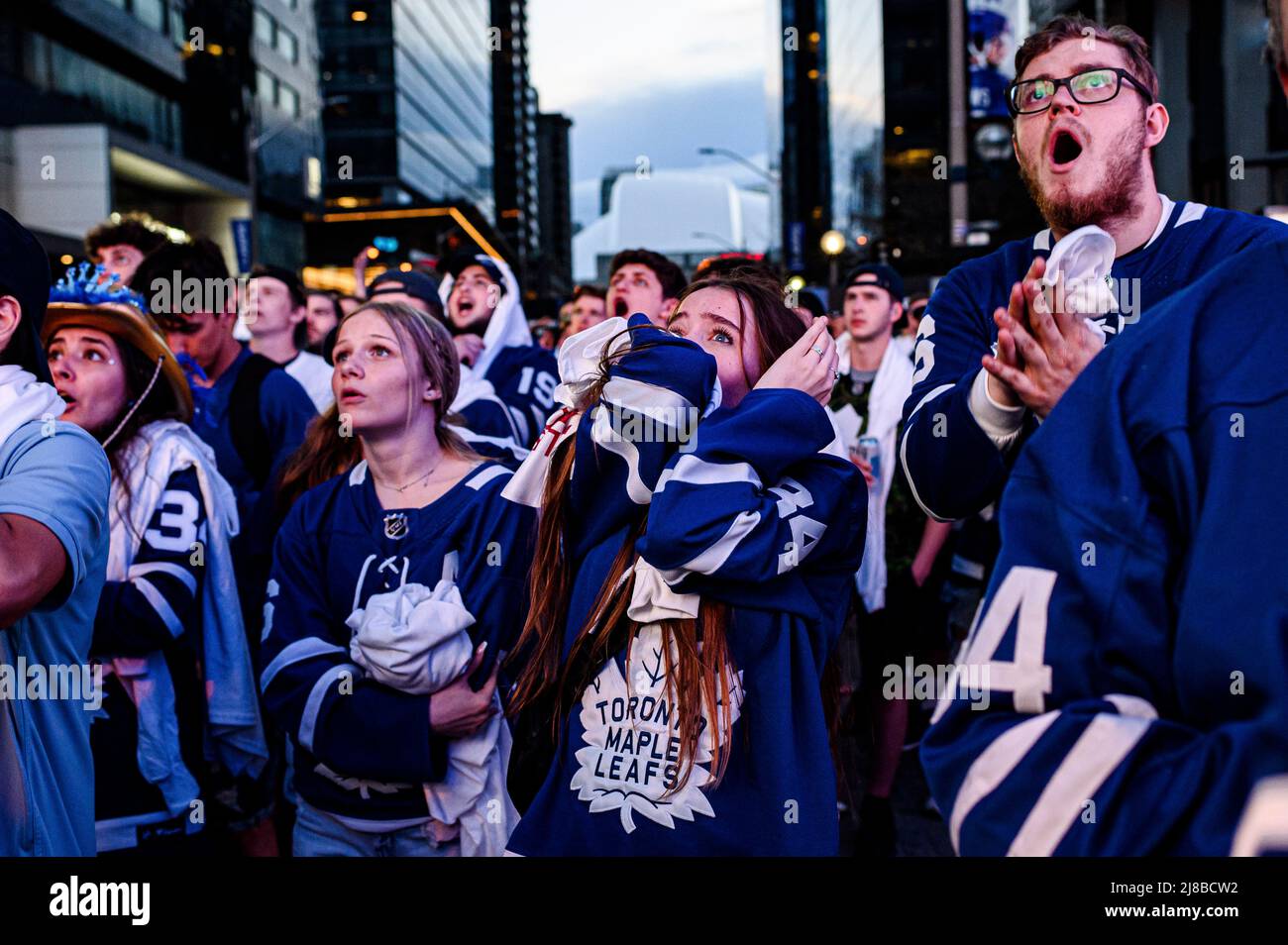 Fans react during game seven of the Toronto Maple Leafs NHL playoff