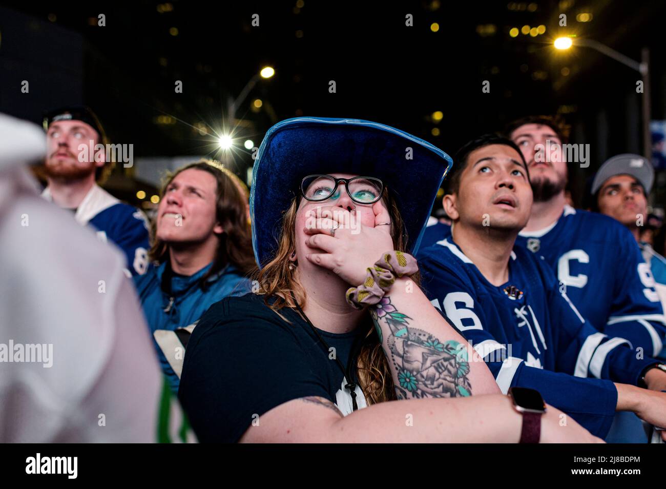 Fans react during game seven of the Toronto Maple Leafs NHL playoff