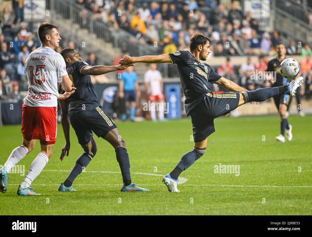 Chester, Pennsylvania, USA. 14th May, 2022. May 14, 2022, Chester PA- Philadelphia Union players NATHAN HARRIEL (26) and CORY BURKE (19) and New York Red Bull player SEAN NEALIS (15) fight for the ball during the match at Subaru Park (Credit Image: © Ricky Fitchett/ZUMA Press Wire) Credit: ZUMA Press, Inc./Alamy Live News Stock Photo