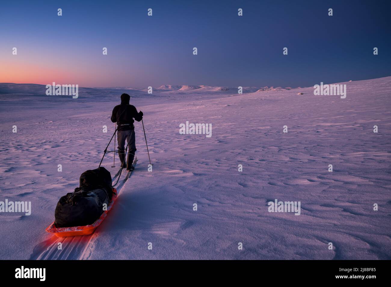Ski touring in Lapland and towards Saarijärvi open wilderness hut, Enontekiö, Lapland, Finland Stock Photo