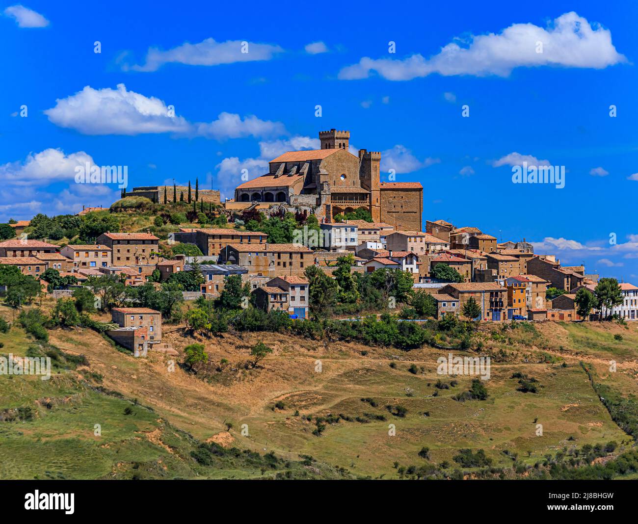 Picturesque view of the hilltop medieval village of Ujue in Navarra, northern Spain on ancient pilgrim route Camino de Santiago or Way of St James Stock Photo