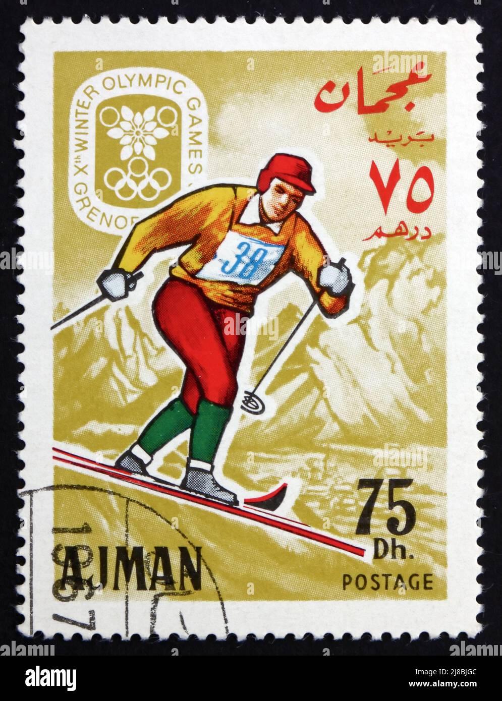 AJMAN - CIRCA 1967: a stamp printed in the Ajman shows Ski Cross-country, Winter Olympics 68, Grenoble, circa 1967 Stock Photo