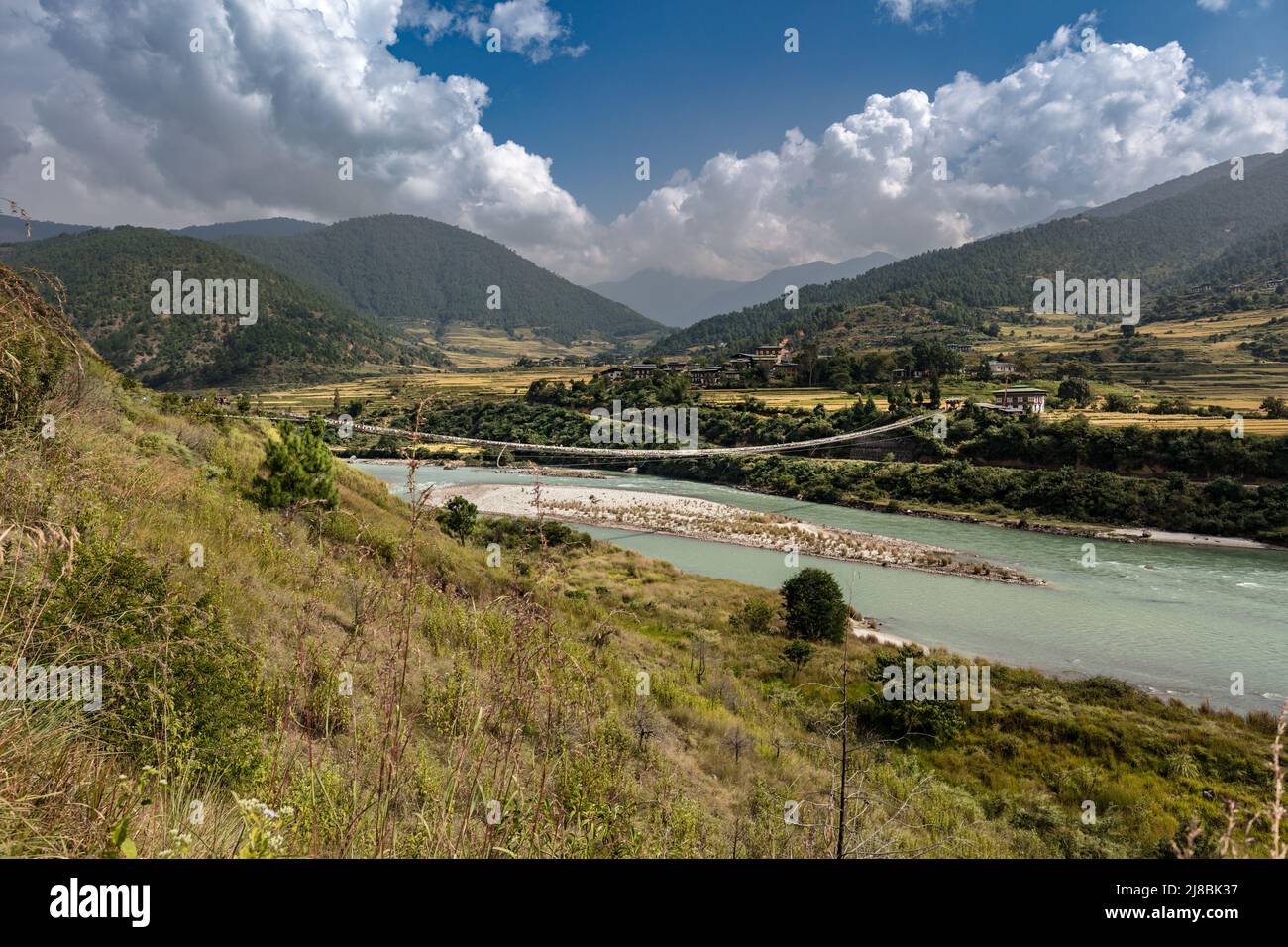 The Punakha Suspension Bridge at the Punakha Dzong. Across the Tsang Chu River to Shengana and Wangkha village. The longest suspension bridge in Bhuta Stock Photo