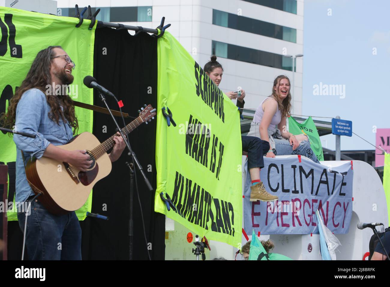 Environmental activists of Extinction Rebellion and Greenpeace protest at the Schiphol Airport on May 14, 2022 in Amsterdam,Netherlands. Environmental Stock Photo