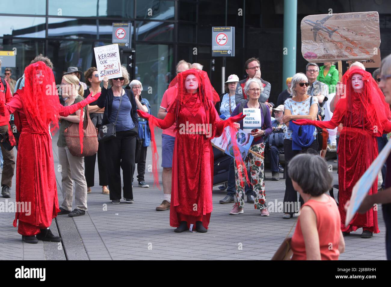 Environmental activists Extinction Rebellion Red Rebells protest at the Schiphol Airport on May 14, 2022 in Amsterdam,Netherlands. Environmental prote Stock Photo