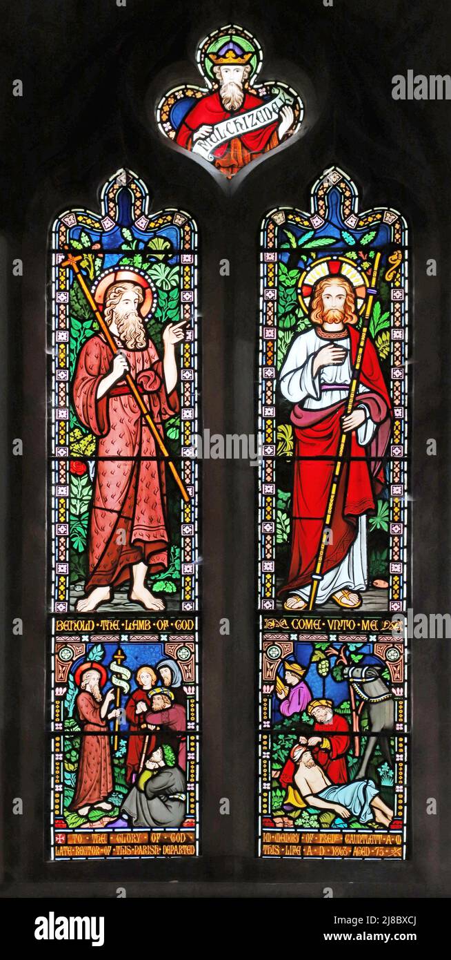 A stained glass window by Frederick Preedy depicting Christ & John the Baptist, the Good Samaritan and John preaching, Fladbury Church, Worcestershire Stock Photo