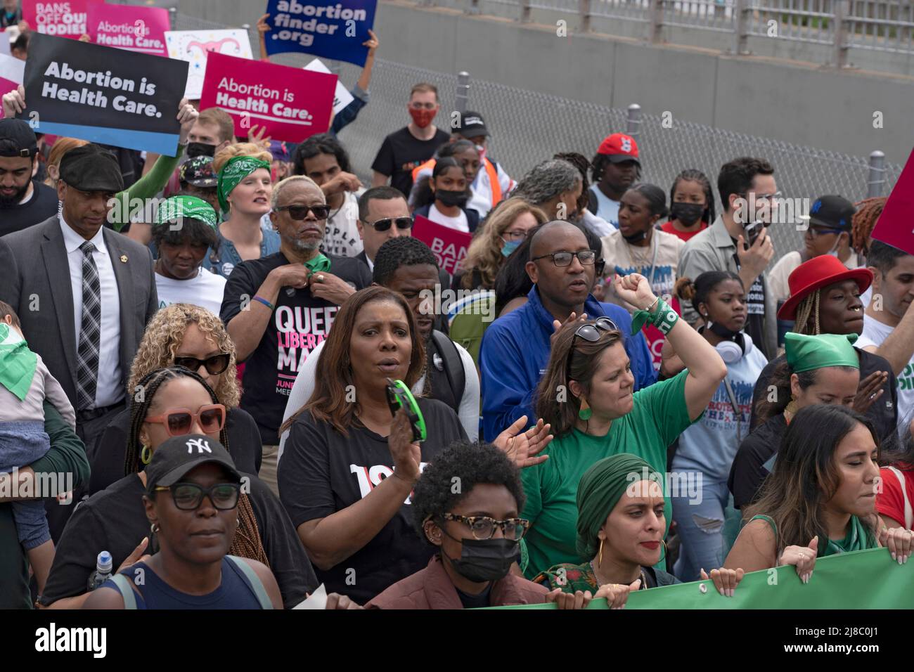 NY Attorney General Letitia James (Second row center), Donovan Richards and Jumaane Williams participate in the Planned Parenthood's 'Bans Off Our Bodies' rally and march from Cadman Plaza across the Brooklyn Bridge to Foley Square in Lower Manhattan in New York City. Abortion rights supporters are holding rallies across the country urging lawmakers to codify abortion rights into law after a leaked draft from the Supreme Court revealed a potential decision to overturn the precedent set by landmark Roe v. Wade. Stock Photo