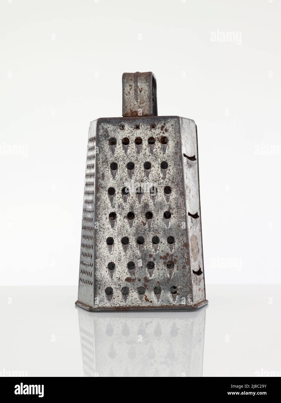 Old Used Kitchen Box Grater Stock Photo
