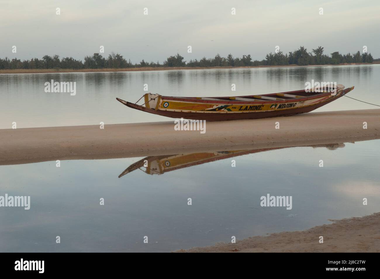 Fishing boat at sunset on the Senegal River. Langue de Barbarie National Park. Saint-Louis. Senegal. Stock Photo