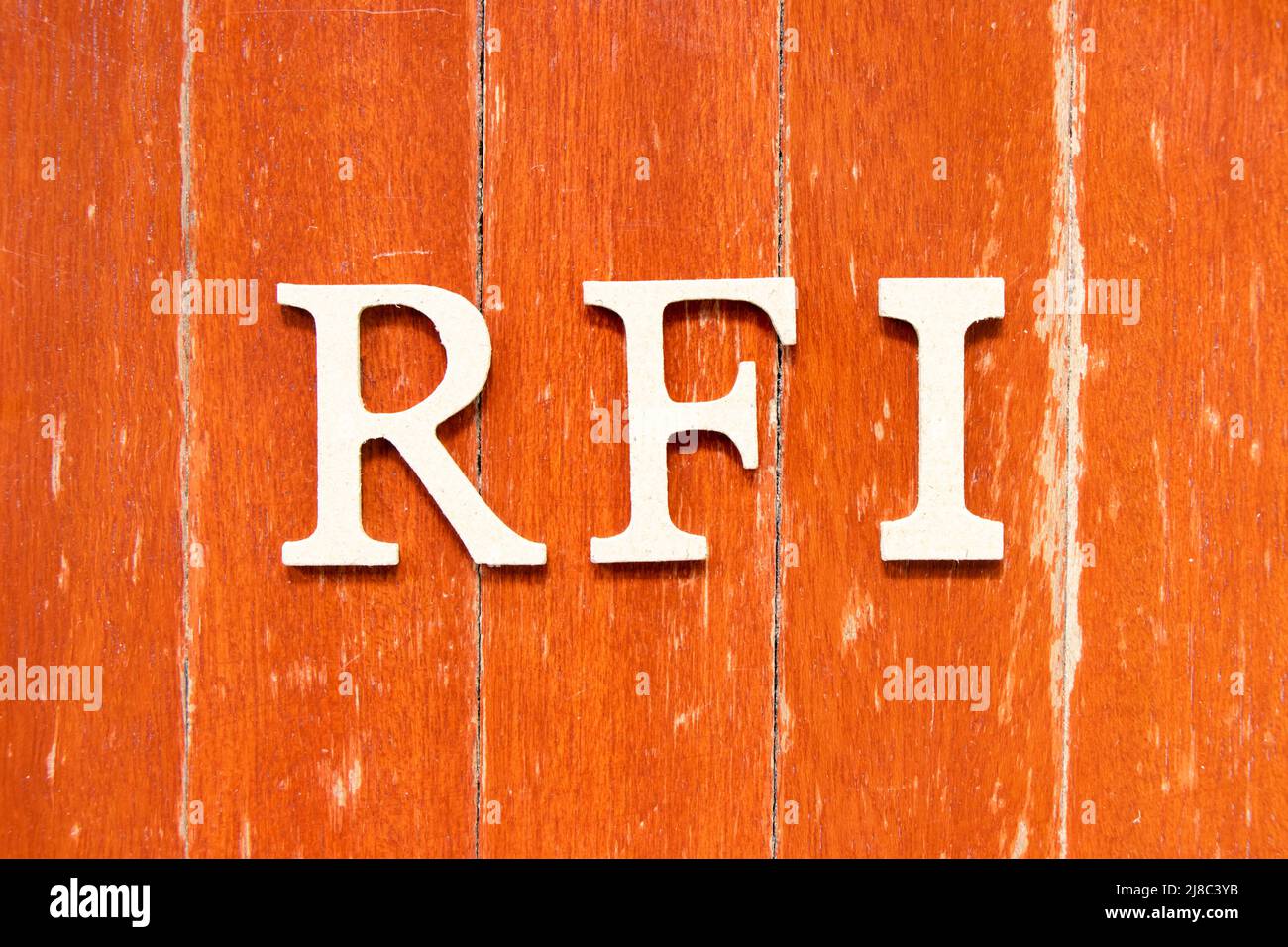 Alphabet letter in word RFI (Abbreviation of request for information) on  old red color wood plate background Stock Photo - Alamy