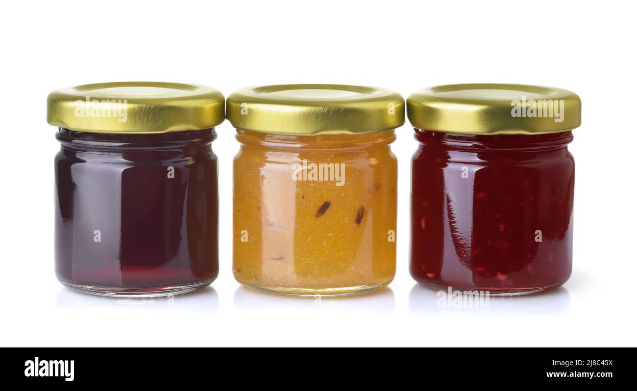 Front view of three different jam jars isolated on white Stock Photo