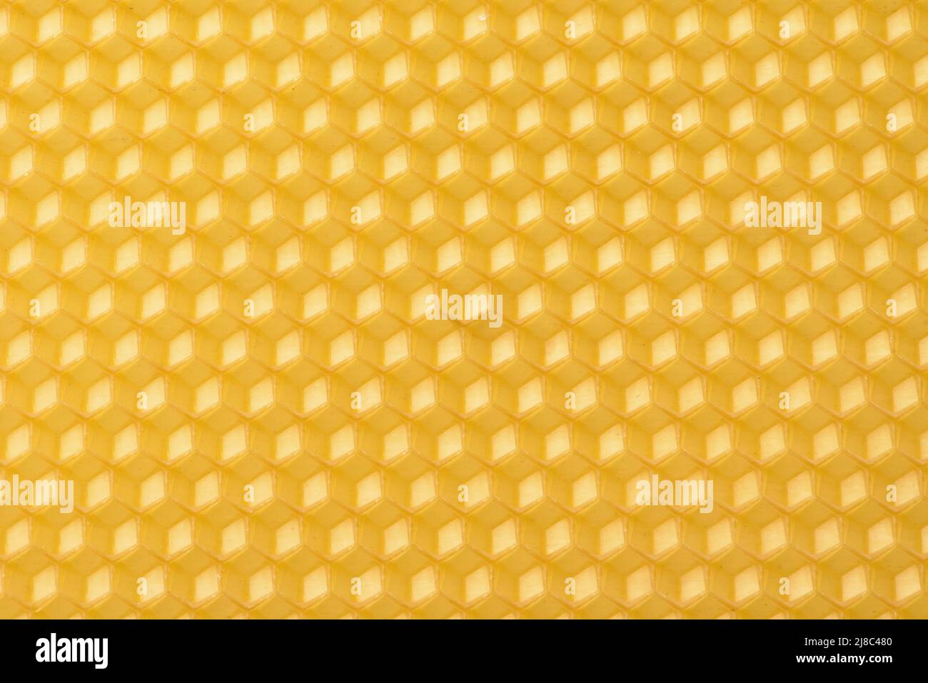 Front view of yellow wax honeycomb base texture Stock Photo