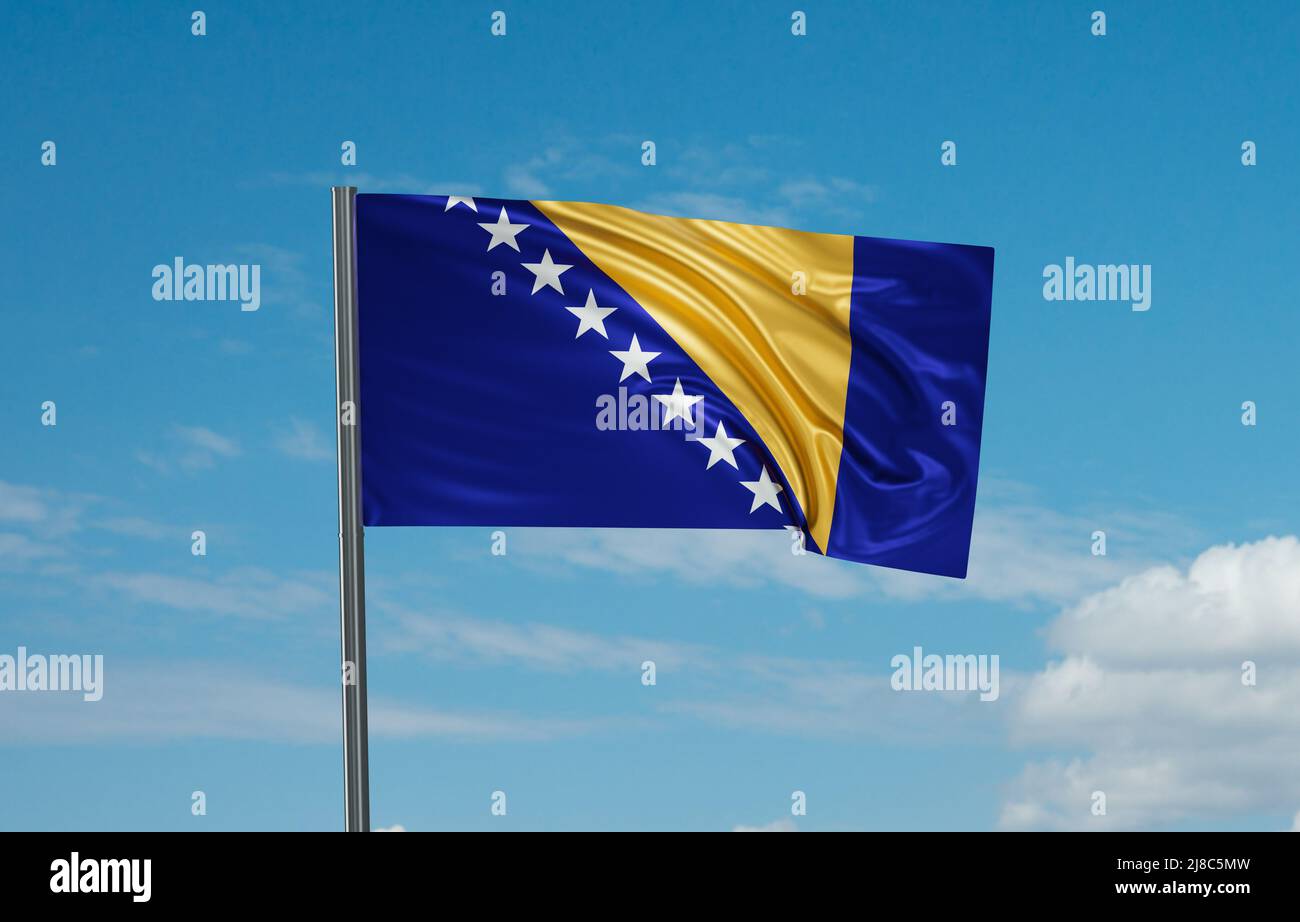 Bosnia and Herzegovina national flag waving in the wind. Sky background ...
