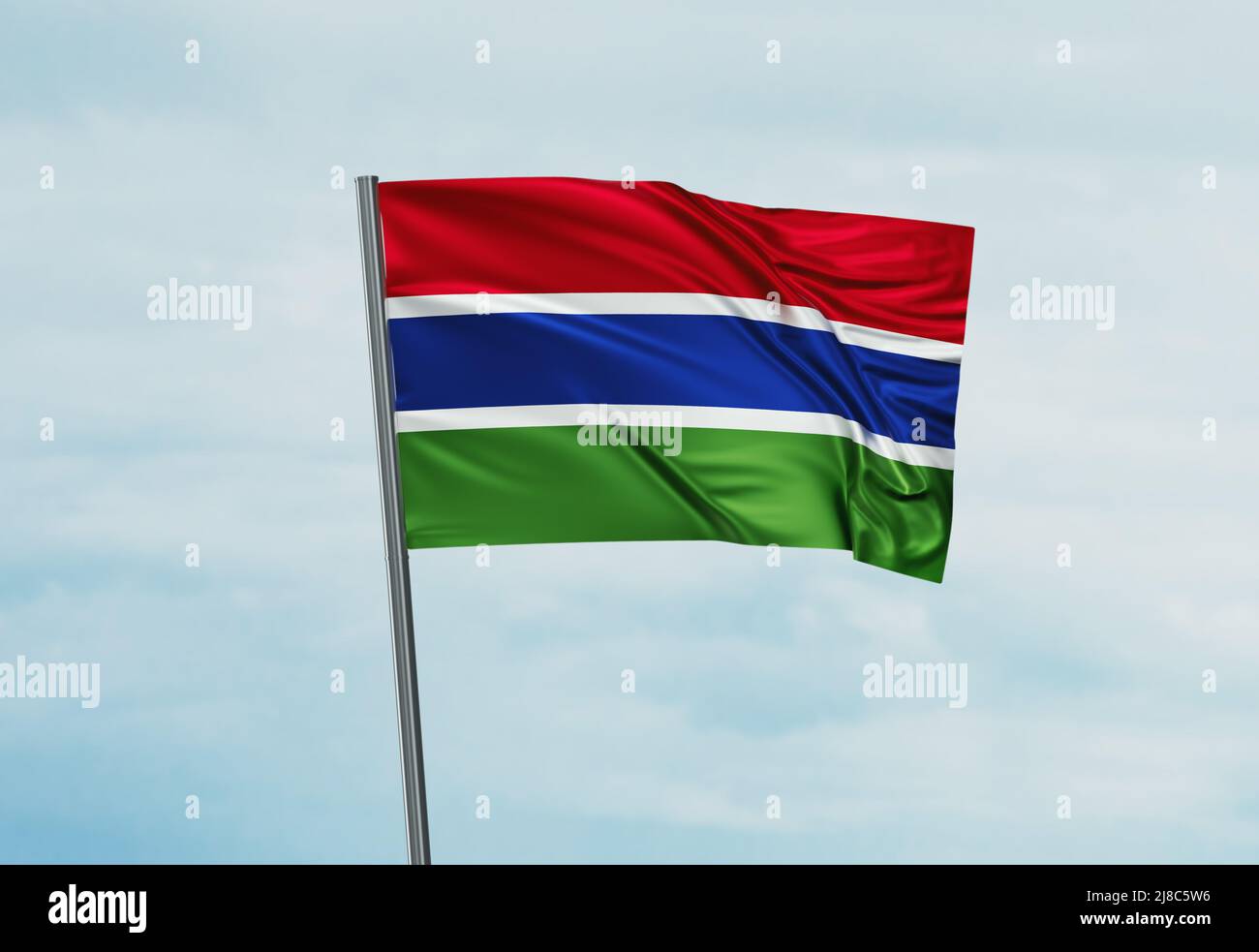 Gambia national flag waving in the wind. Sky background 3D illustration ...