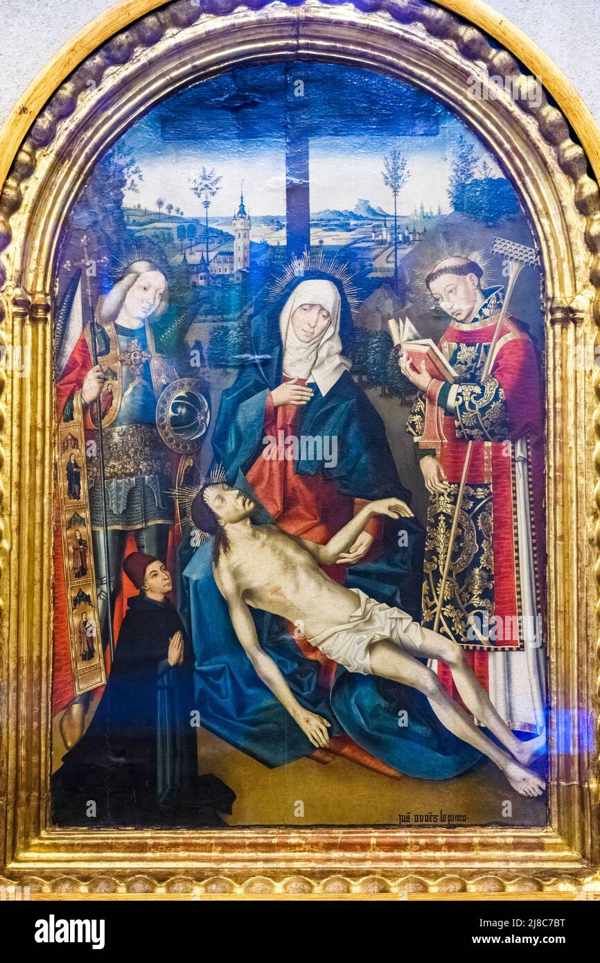 Piety with Saint Vincent, Saint Miguel and a Donor by Juan Nunex 15th century - Seville Cathedral, Spain Stock Photo