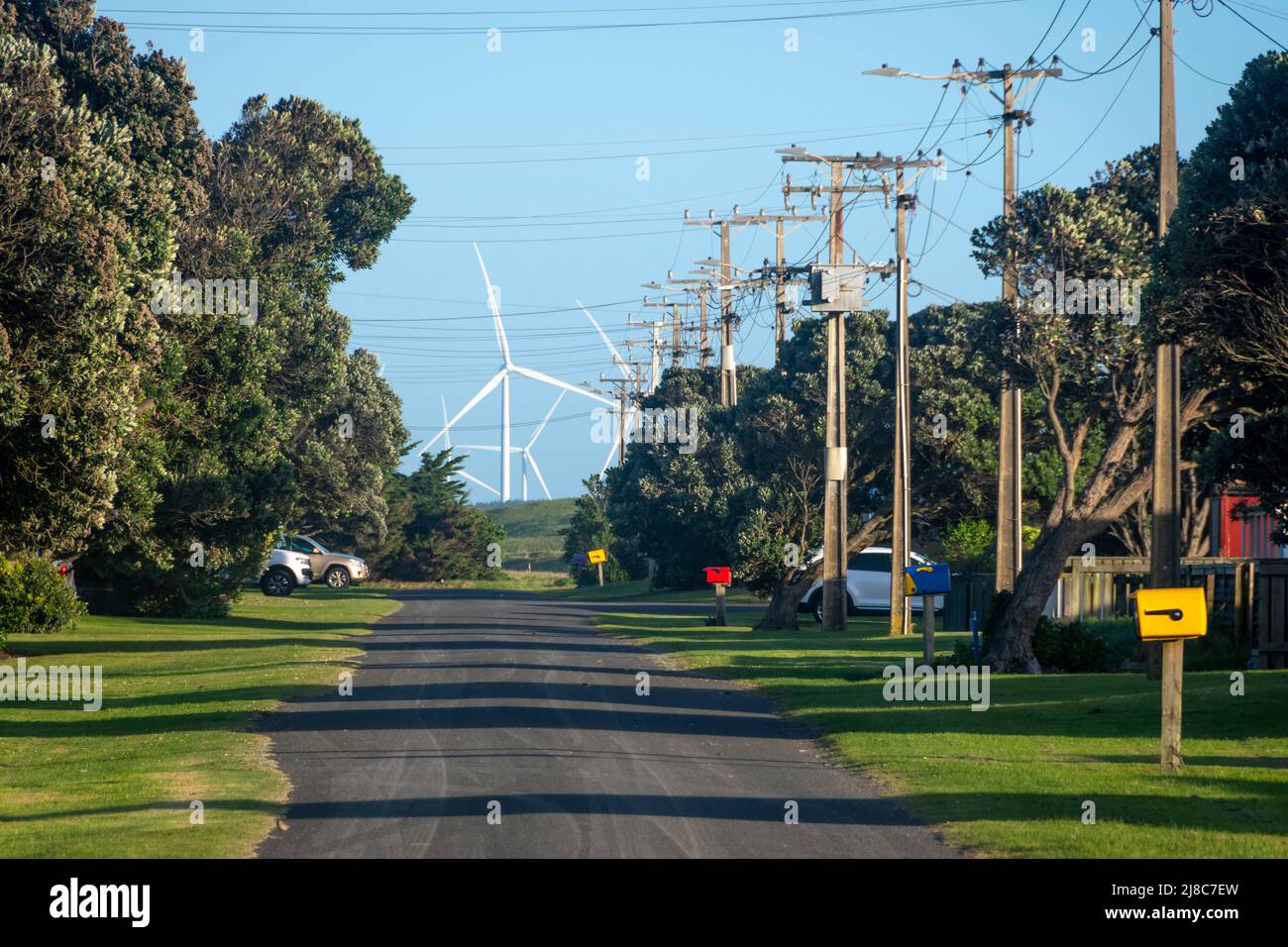 Looking down the road to wind turbines at Waipipi, Waverly Beach, South