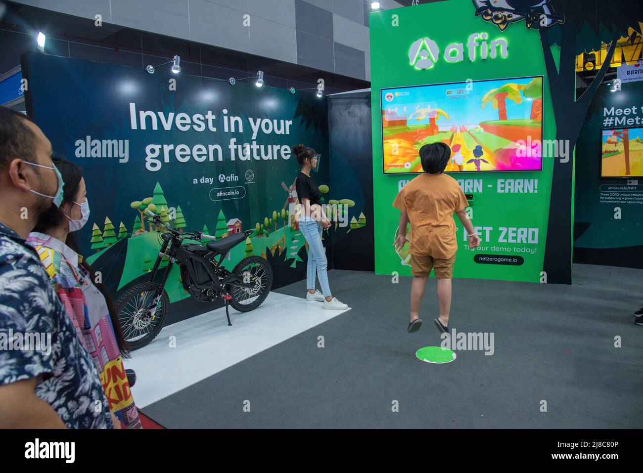 A kid seen playing games to earn cryptocurrency at 