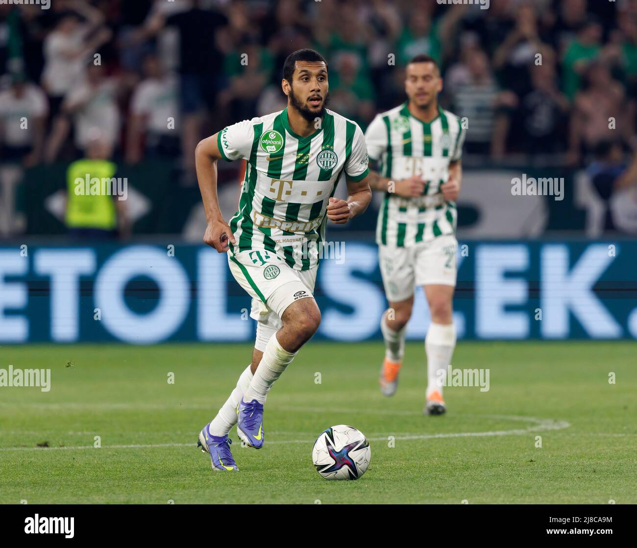 BUDAPEST, HUNGARY - MAY 11: Franck Boli of Ferencvarosi TC celebrates after  scoring a goal with Miha Blazic of Ferencvarosi TC during the Hungarian Cup  Final match between Ferencvarosi TC and Paksi