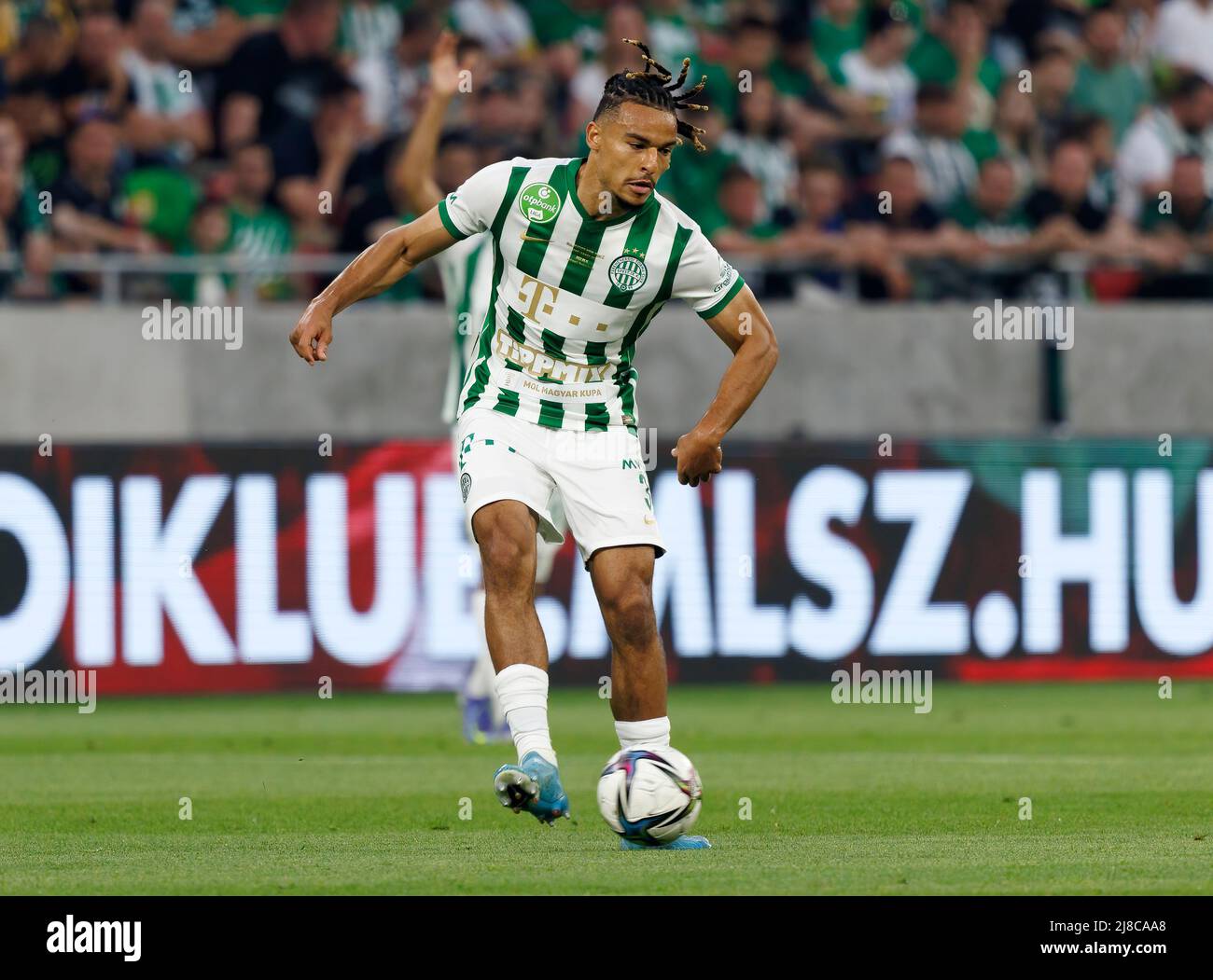 BUDAPEST, HUNGARY - MAY 11: Kristoffer Zachariassen of Ferencvarosi TC runs  with the ball during the Hungarian Cup Final match between Ferencvarosi TC  and Paksi FC at Puskas Arena on May 11