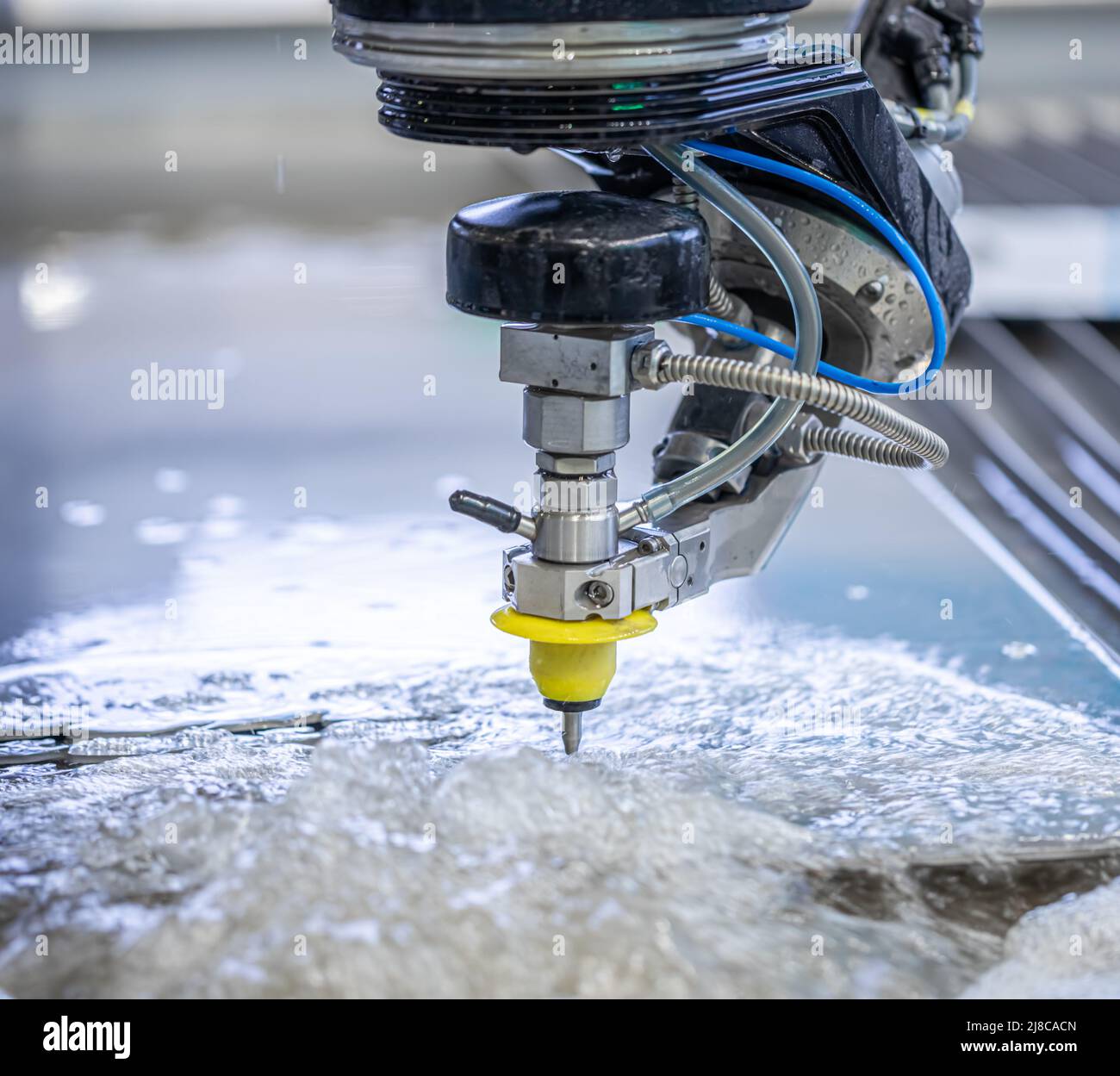 CNC water jet cutting machine modern industrial technology. Stock Photo