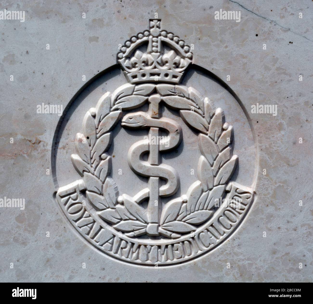 Army Medical Corps badge on a war grave, UK Stock Photo