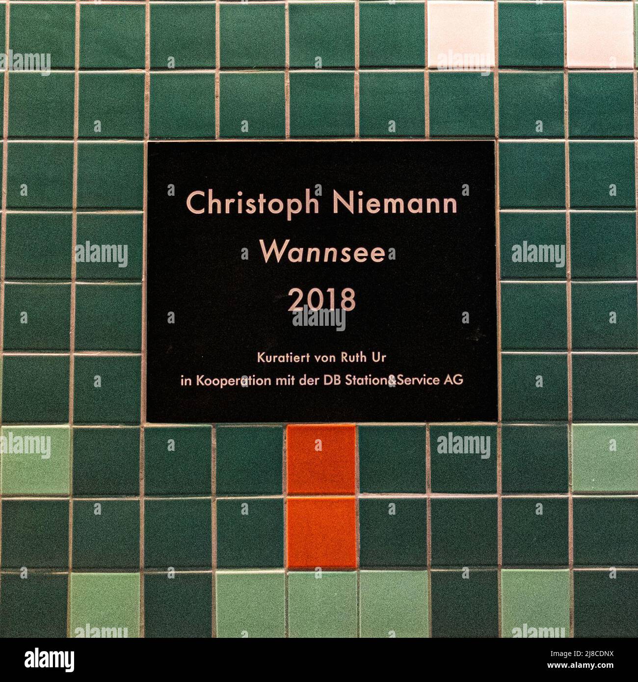 Berlin-Wannsee railway station interior tiled passage & Christophe Niemann 2018 plaque. Important junction in the commuter transport network serving the S-bahn and Deutsche Bahn train services. Stock Photo