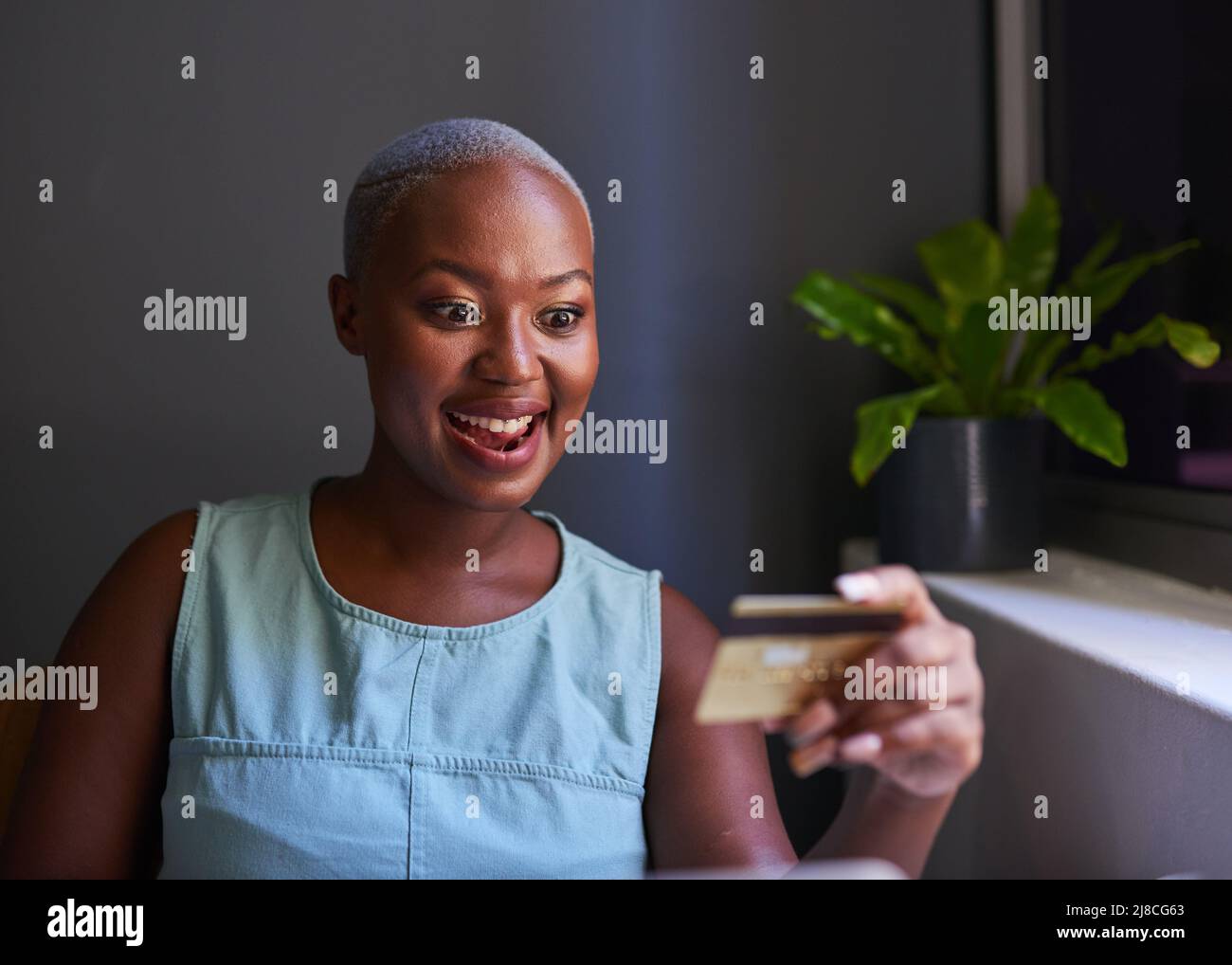 Excited black woman hi-res stock photography and images - Alamy