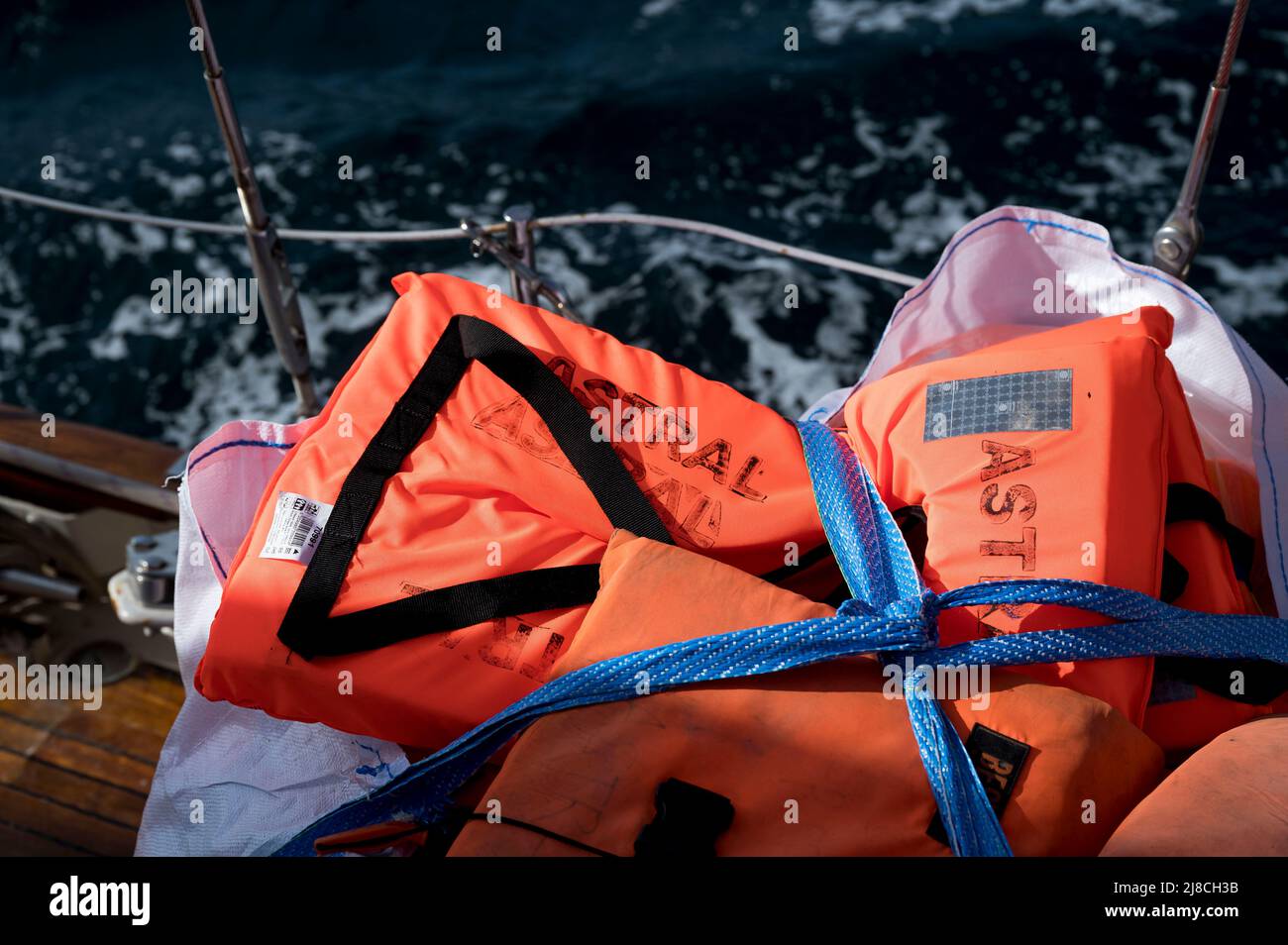 May 15, 2022, Badalona, Catanzaro, Spain: Life jackets with the word ''Astral'' seen onboard. The Spanish NGO Open Arms starts a new rescue mission in Central Mediterranean area, with their first sailboat Astral. (Credit Image: © Valeria Ferraro/ZUMA Press Wire) Stock Photo