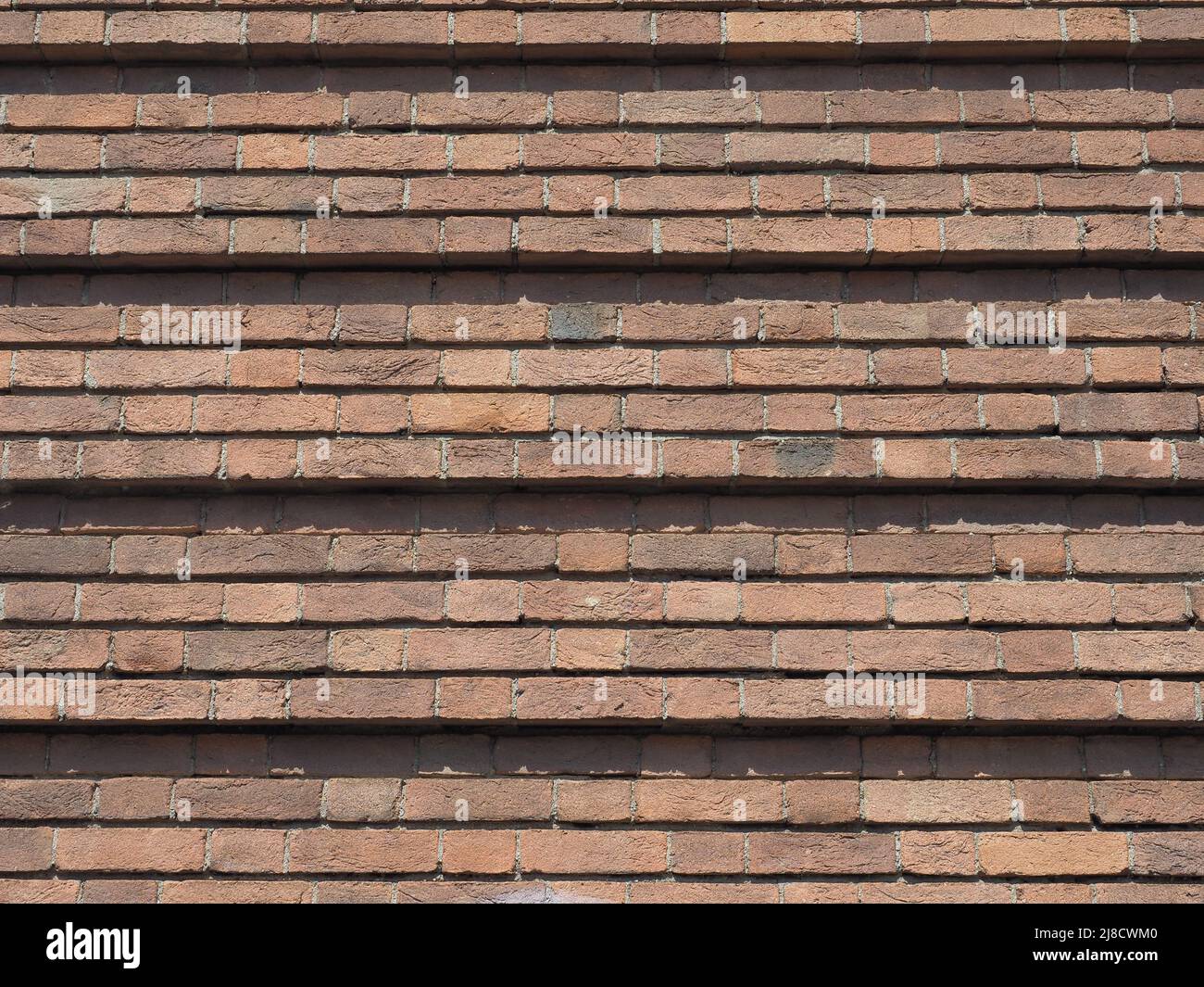 red brick wall useful as a background Stock Photo - Alamy