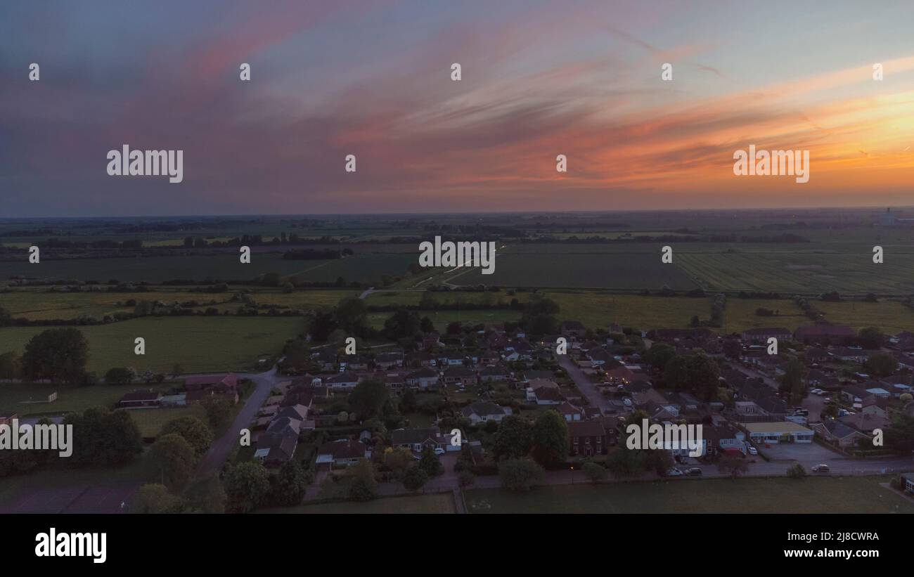 An aerial view of sunset over the village of West Winch near Kings Lynn